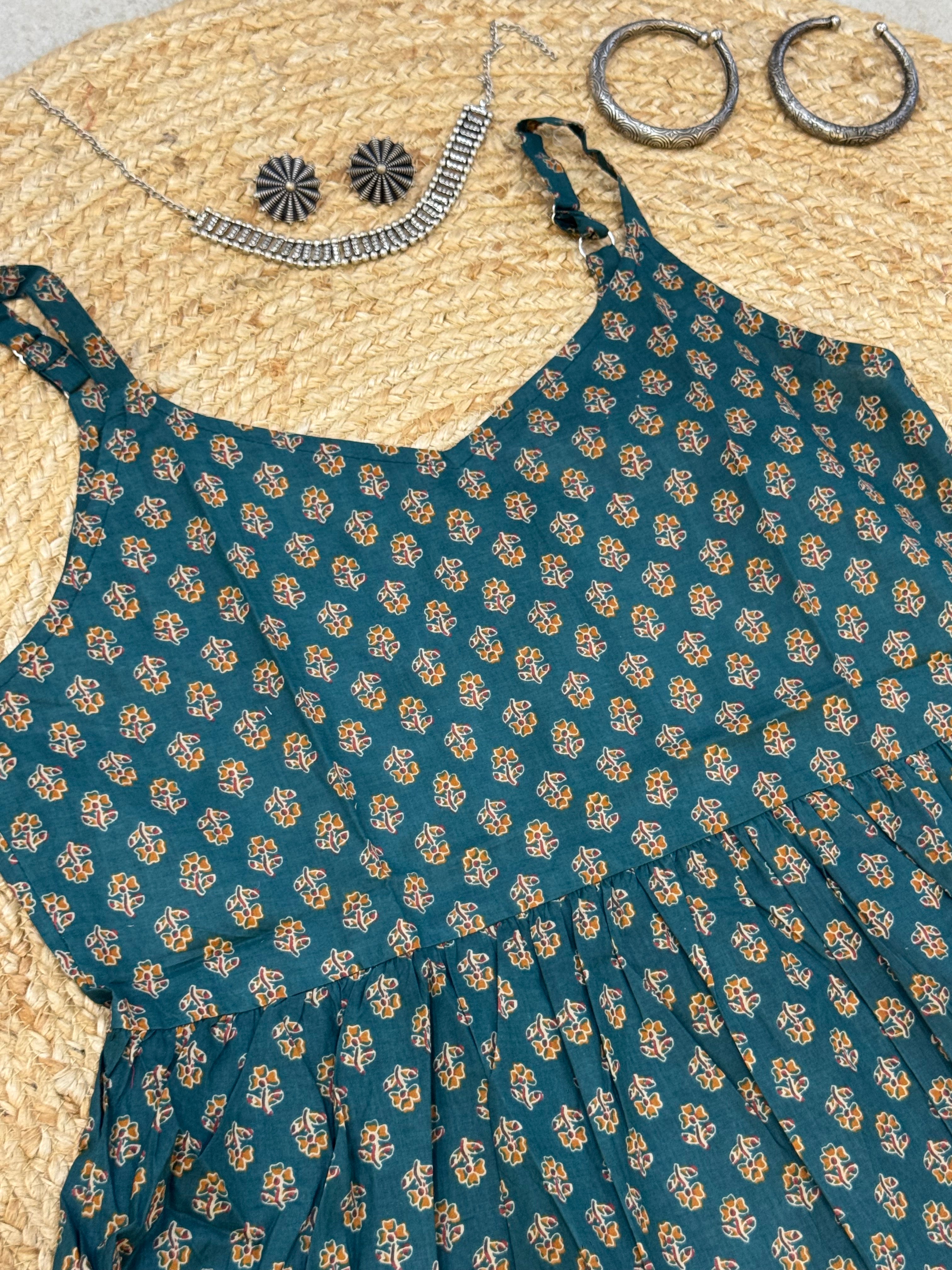 SLEEVELESS PEPLUM STYLE COTTON TOP