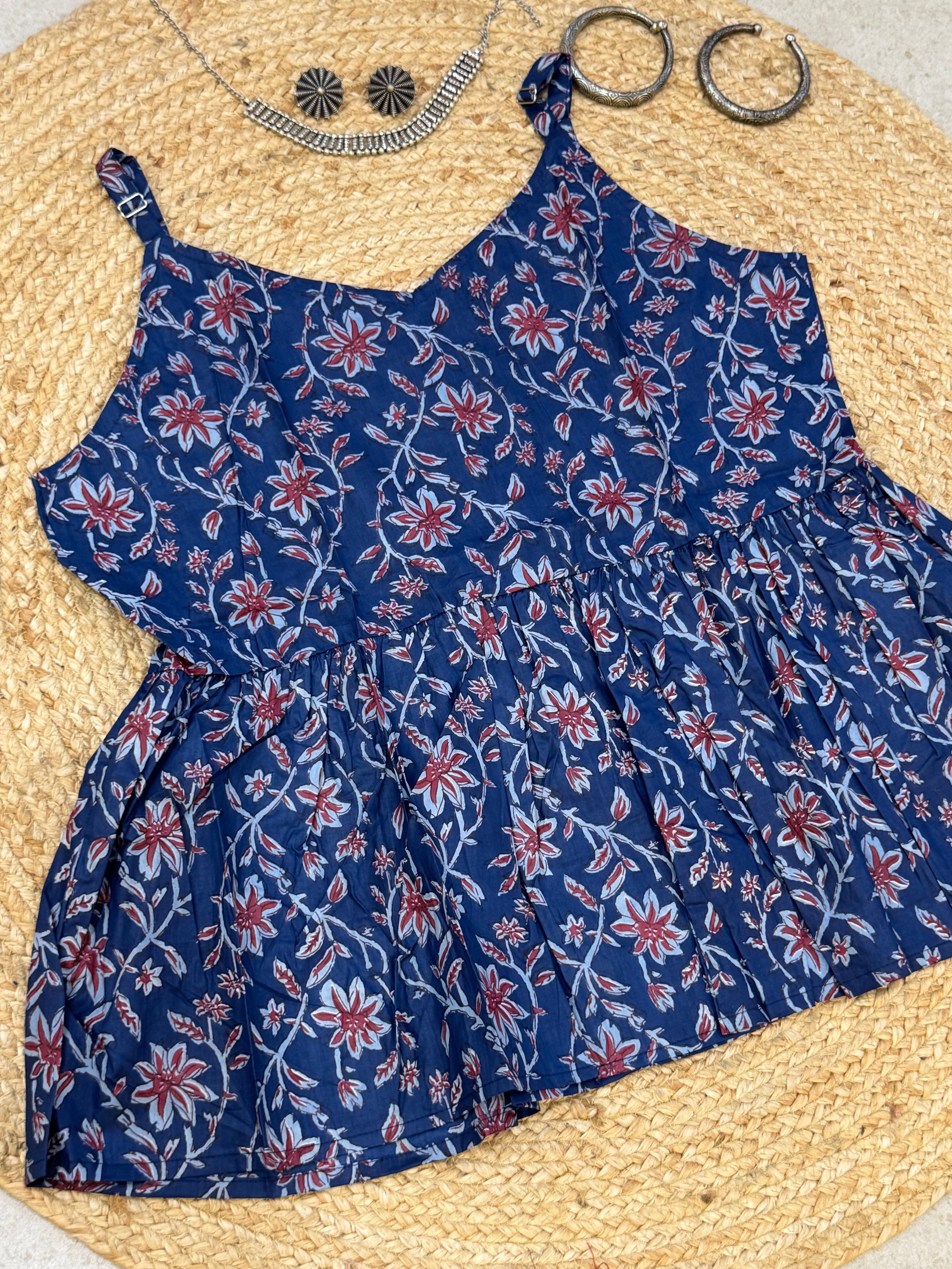 SLEEVELESS PEPLUM STYLE COTTON TOP