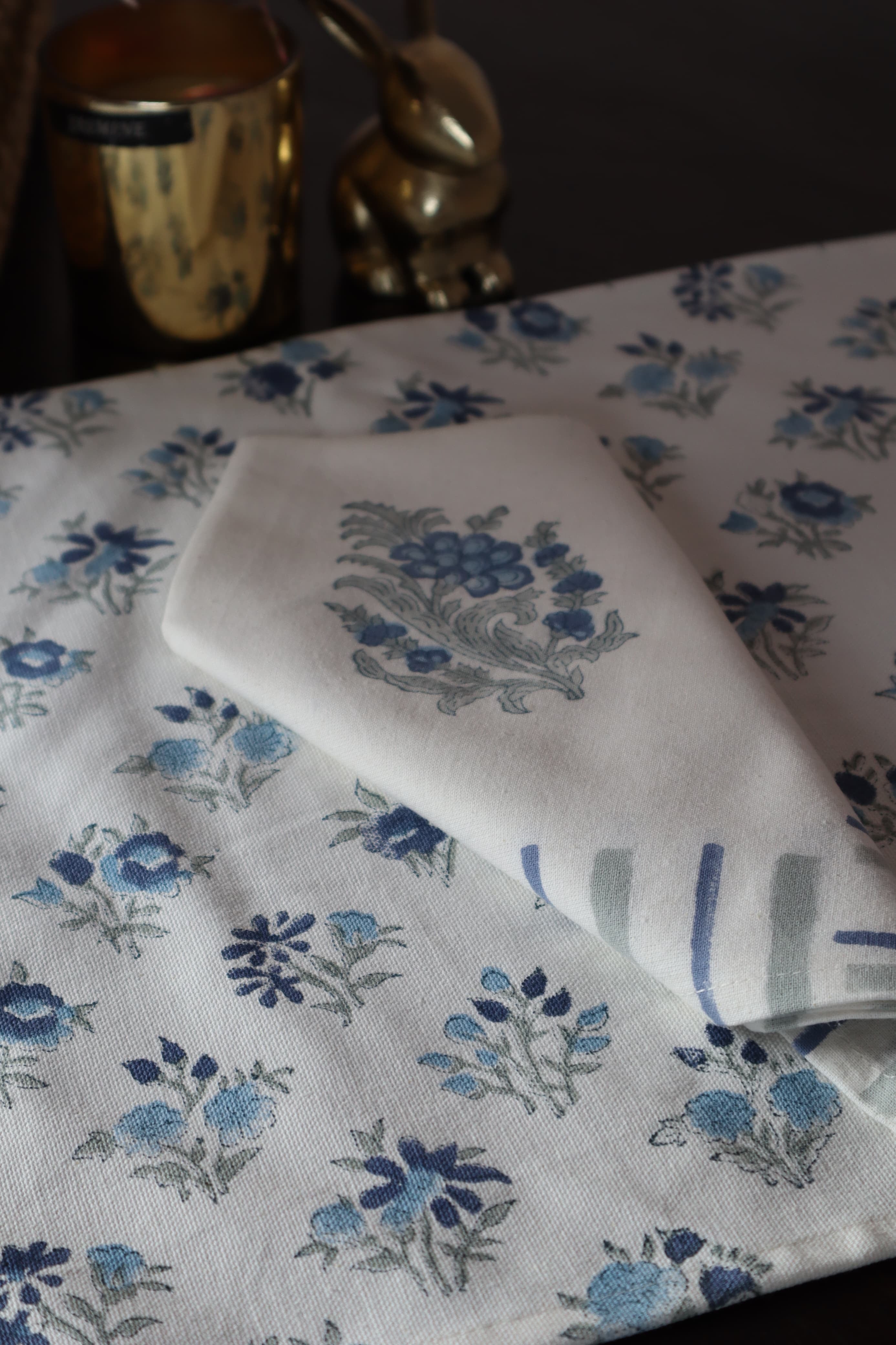 A PAIR OF HANDBLOCK PRINTED TABLE MAT AND NAPKIN SET