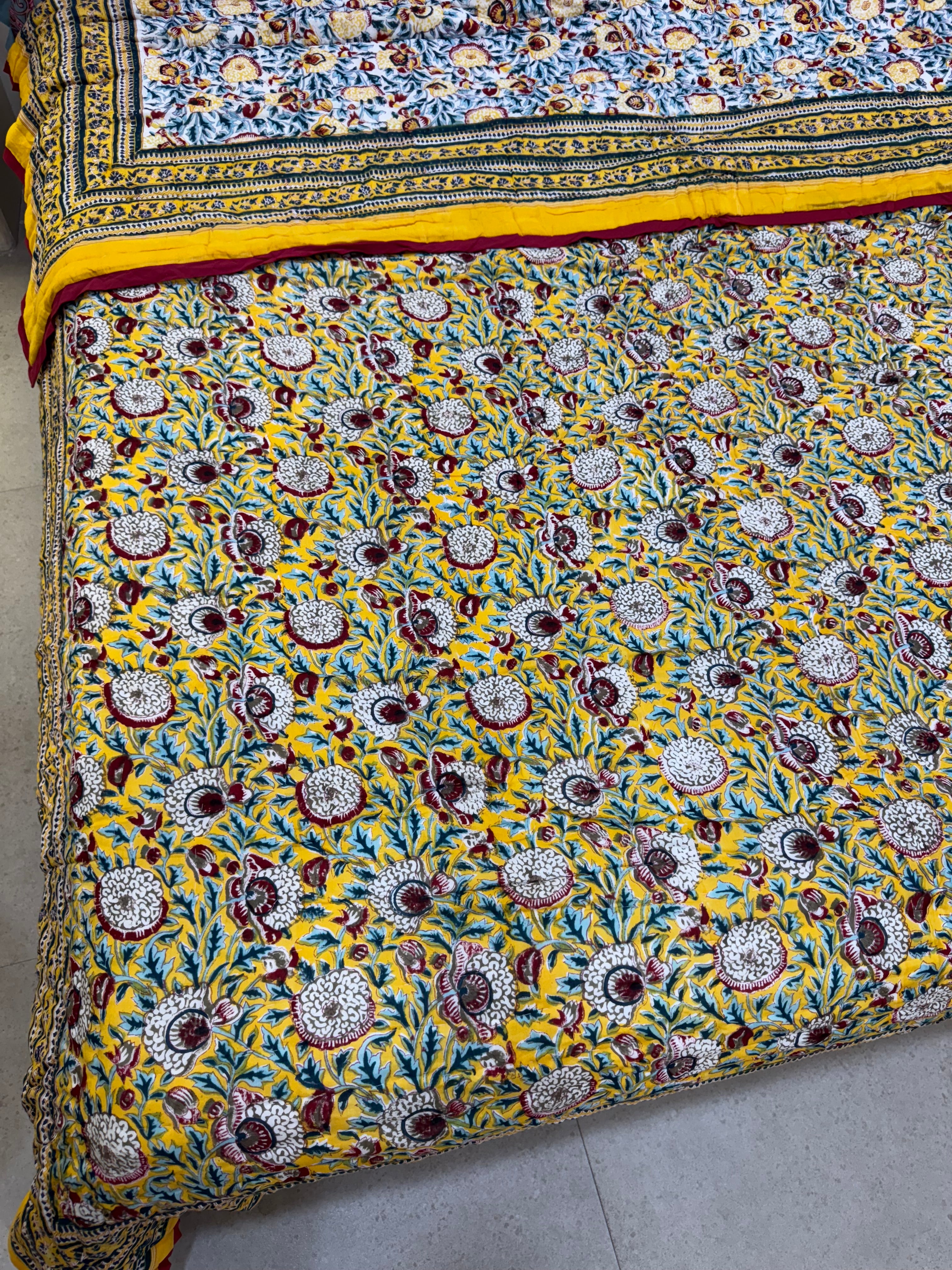 FESTIVE HAND BLOCK PRINTED REVERSIBLE QUILT (DOUBLE BED)