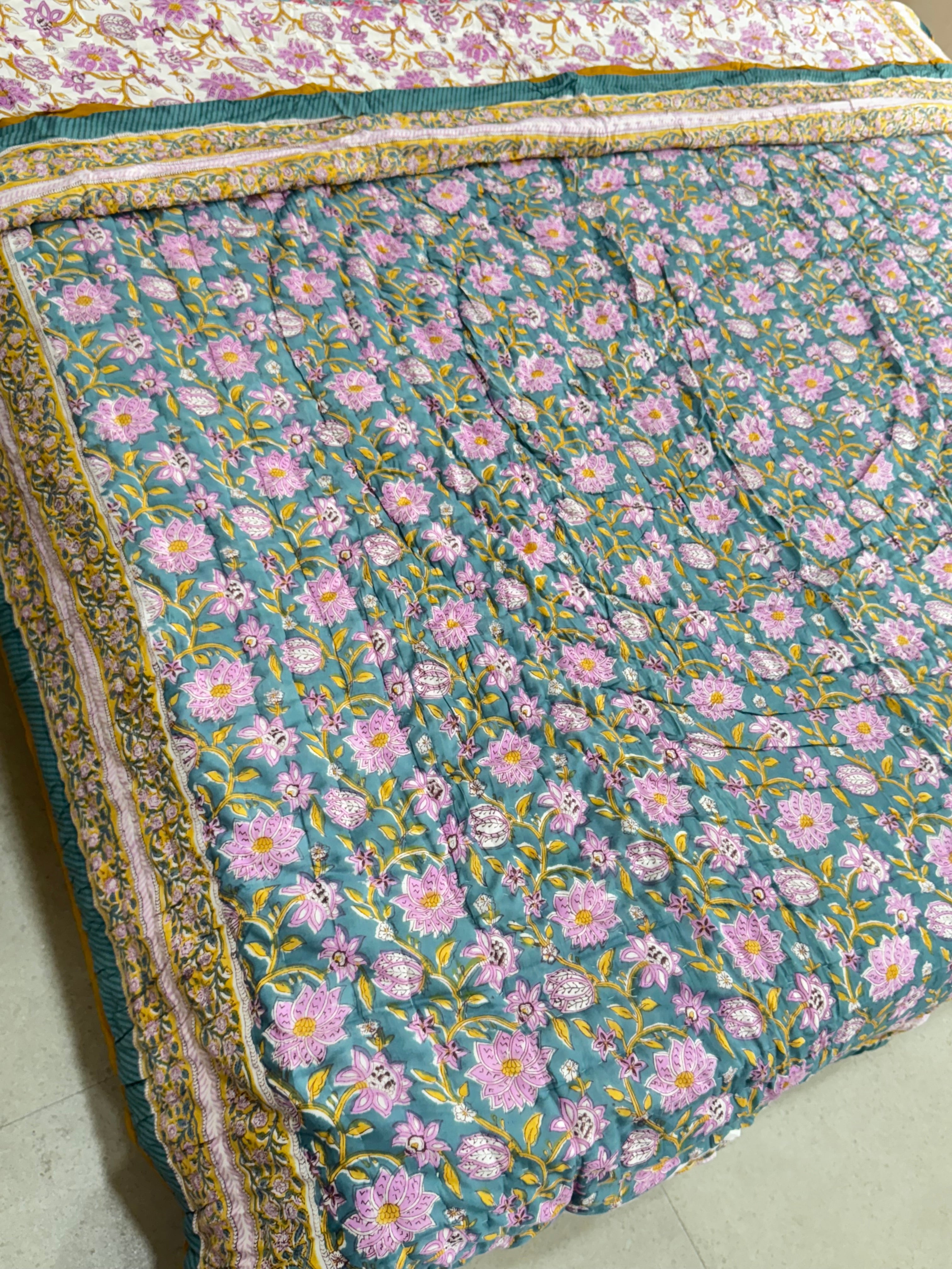 FESTIVE HAND BLOCK PRINTED REVERSIBLE QUILT (SINGLE BED)