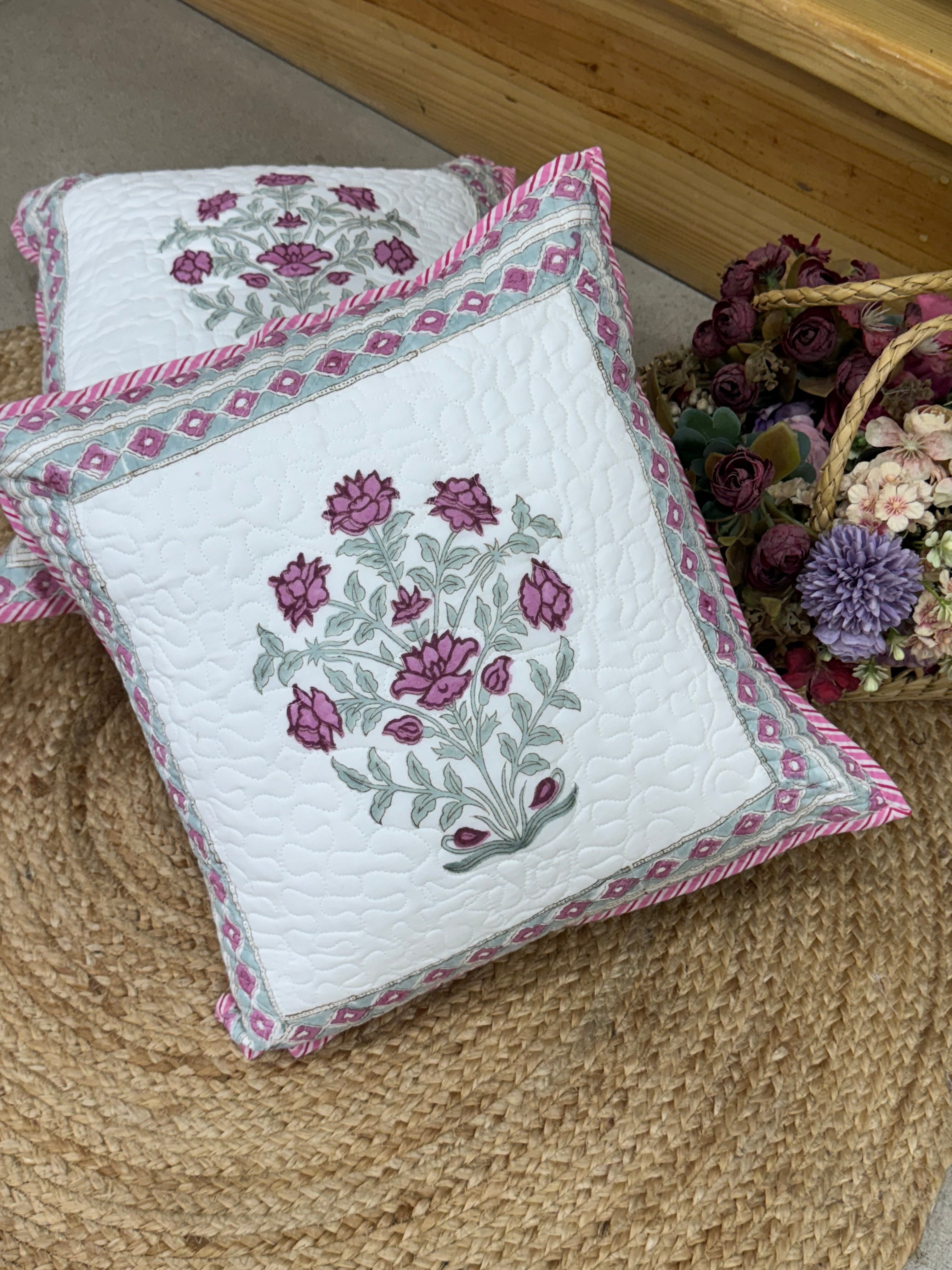 A PAIR OF QUILTED HANDBLOCK PRINTED 16*16 INCHES CUSHION