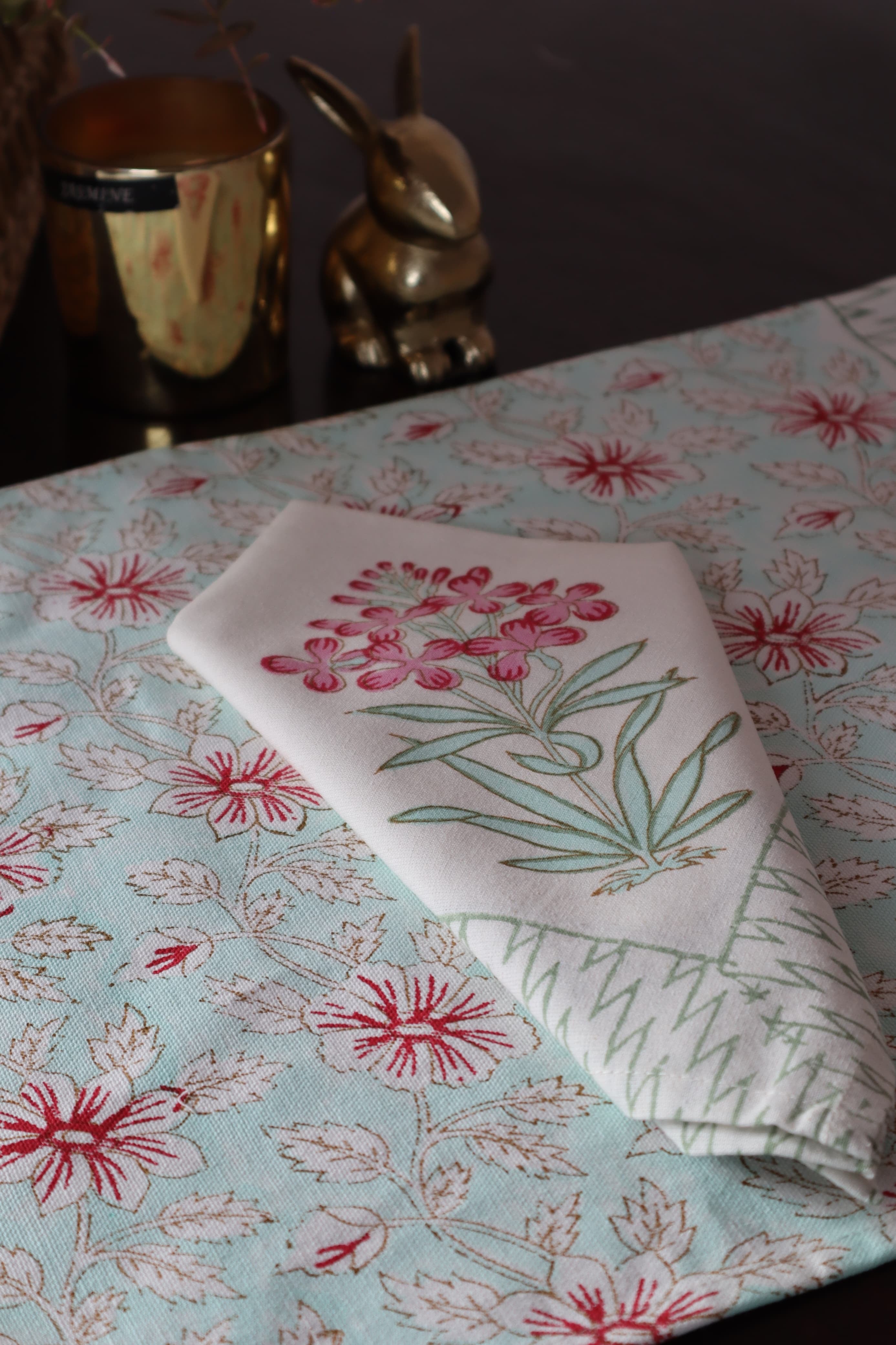 A PAIR OF HANDBLOCK PRINTED TABLE MAT AND NAPKIN SET