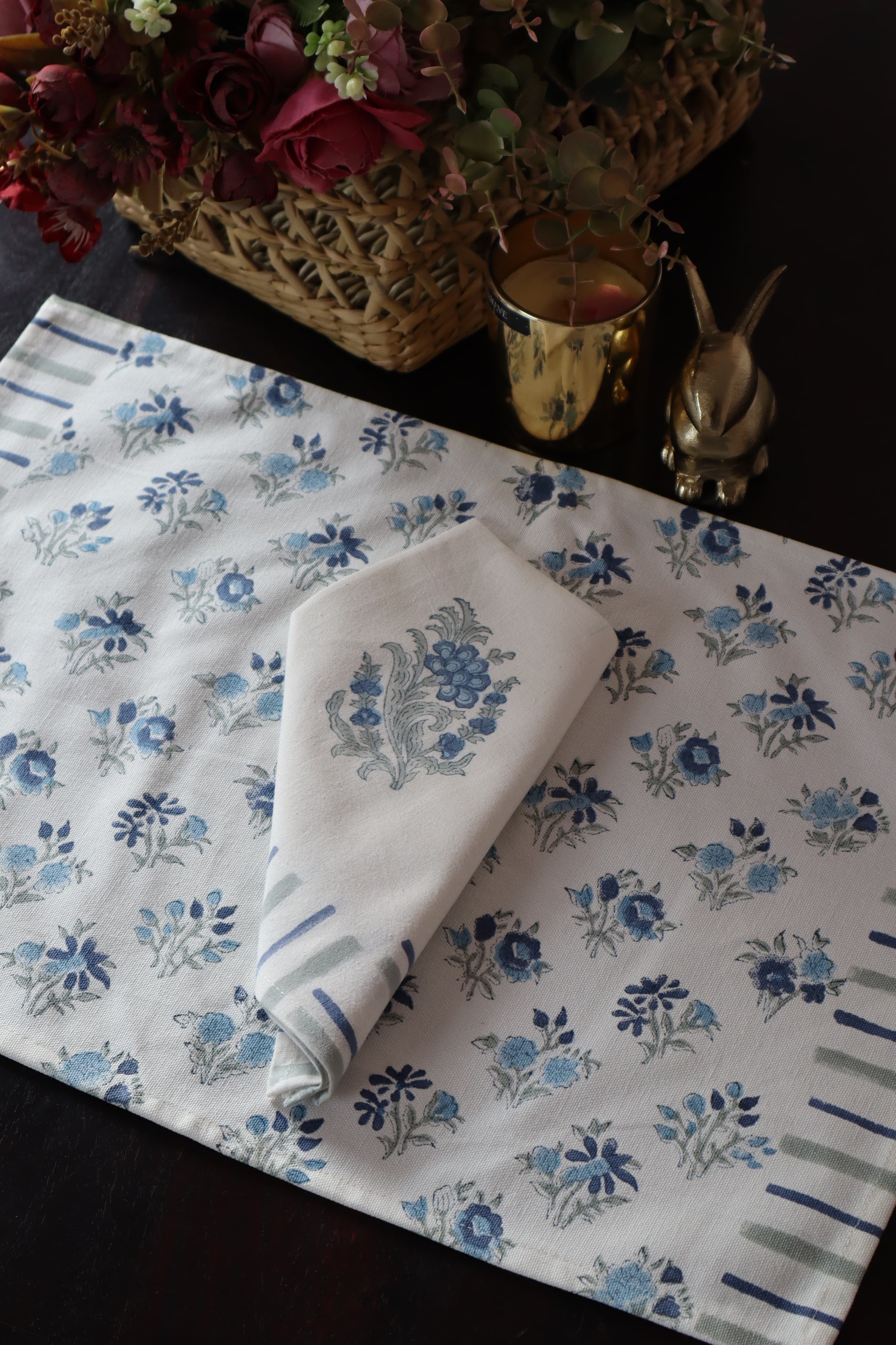 A PAIR OF HANDBLOCK PRINTED TABLE MAT AND NAPKIN SET