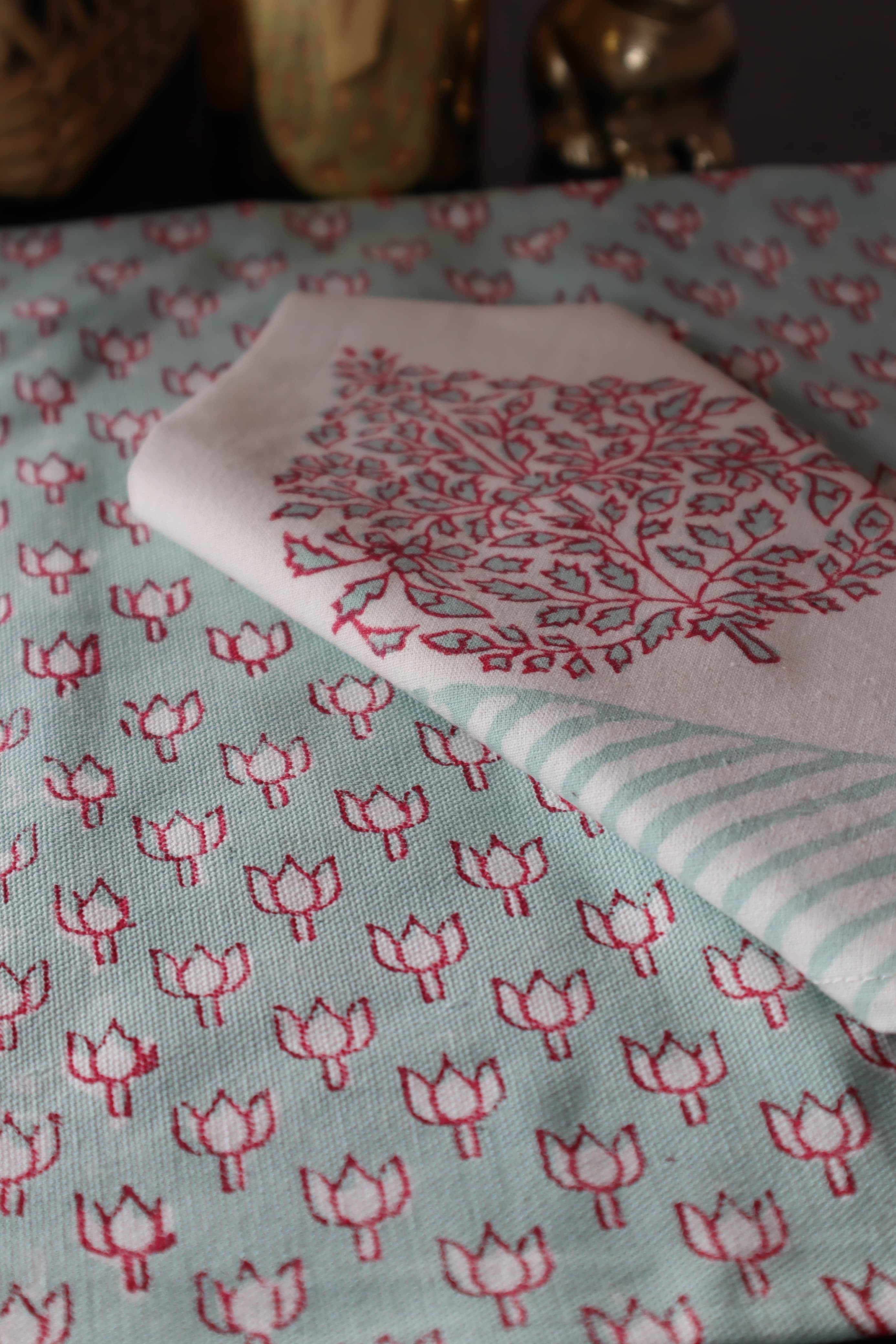 A PAIR OF HANDBLOCK PRINTED TABLE MAT AND NAPKIN SET