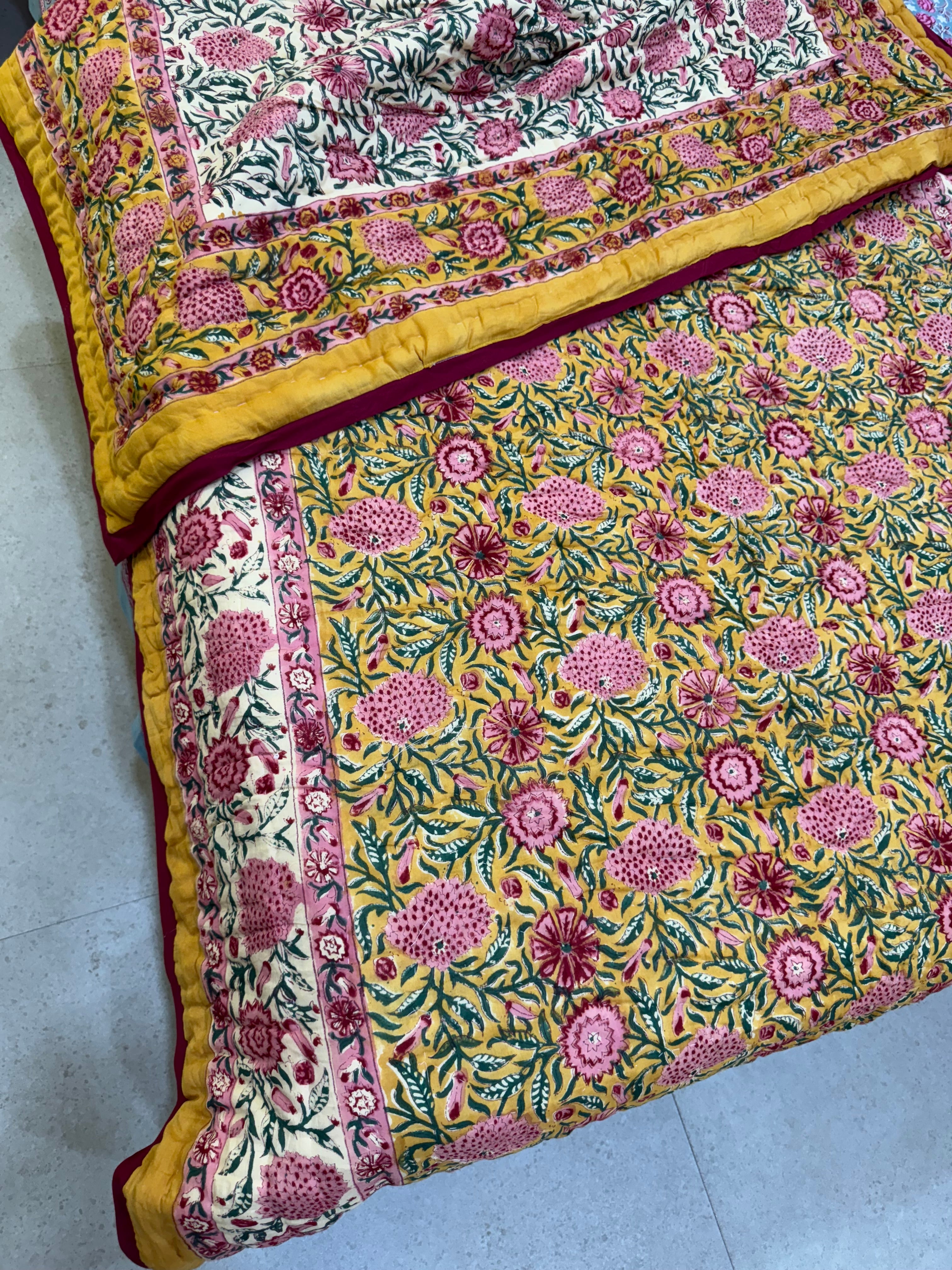 FESTIVE HAND BLOCK PRINTED REVERSIBLE QUILT (SINGLE BED)