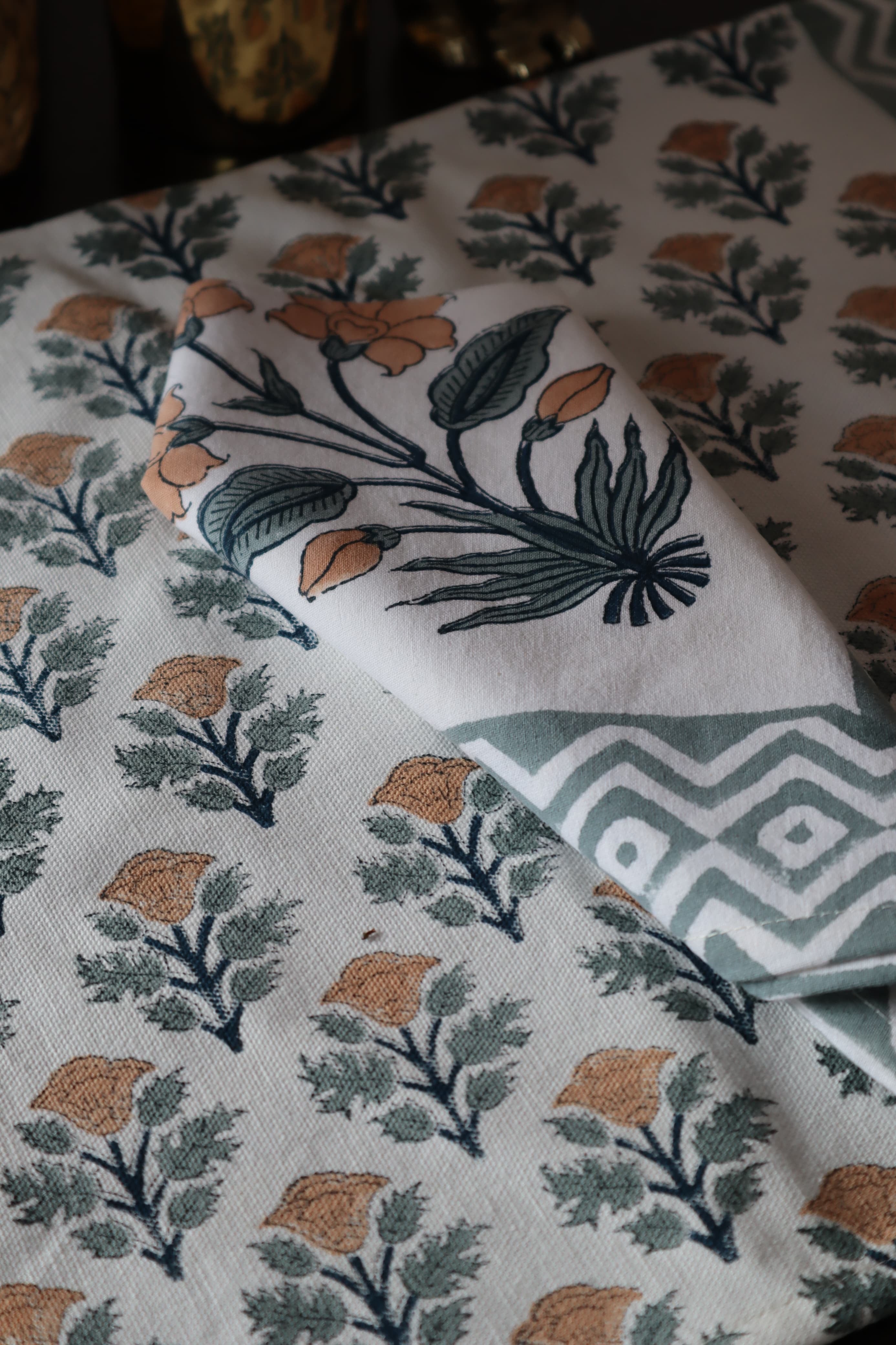 A PAIR OF HANDBLOCK PRINTED TABLE MAT AND NAPKIN SET