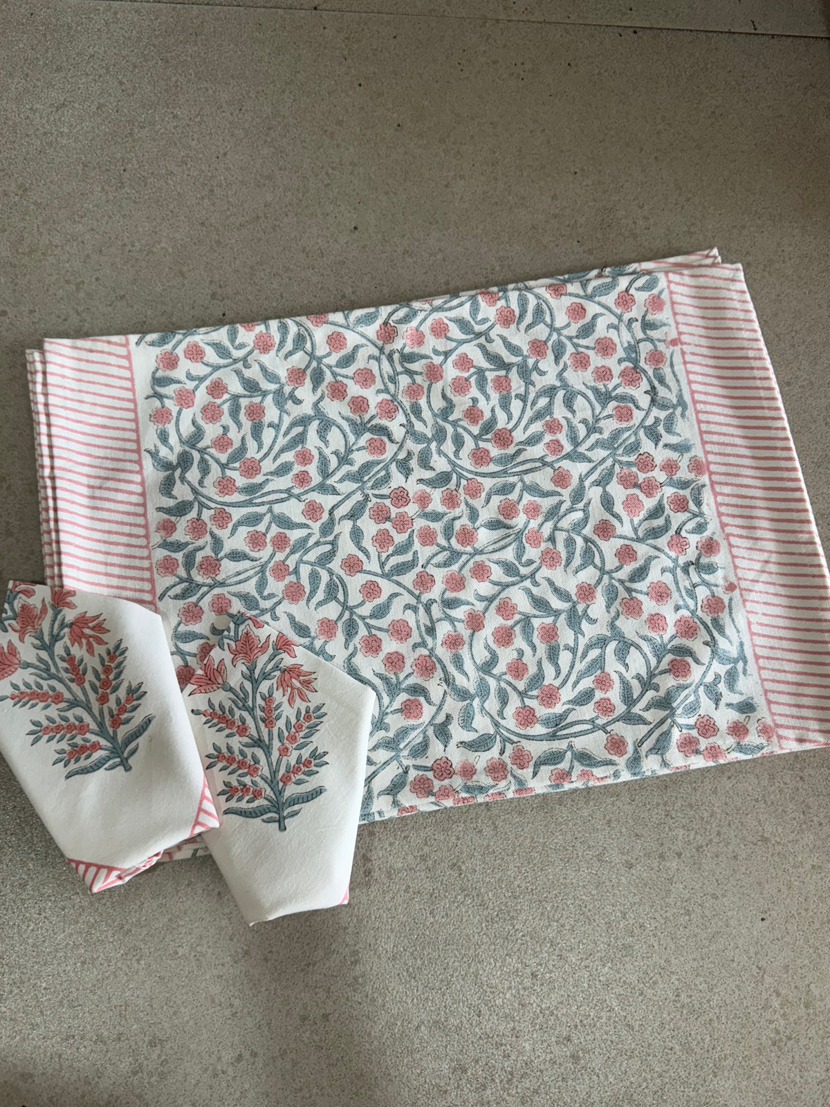 A PAIR OF HANDBLOCK PRINTED TABLE MAT AND NAPKIN SET