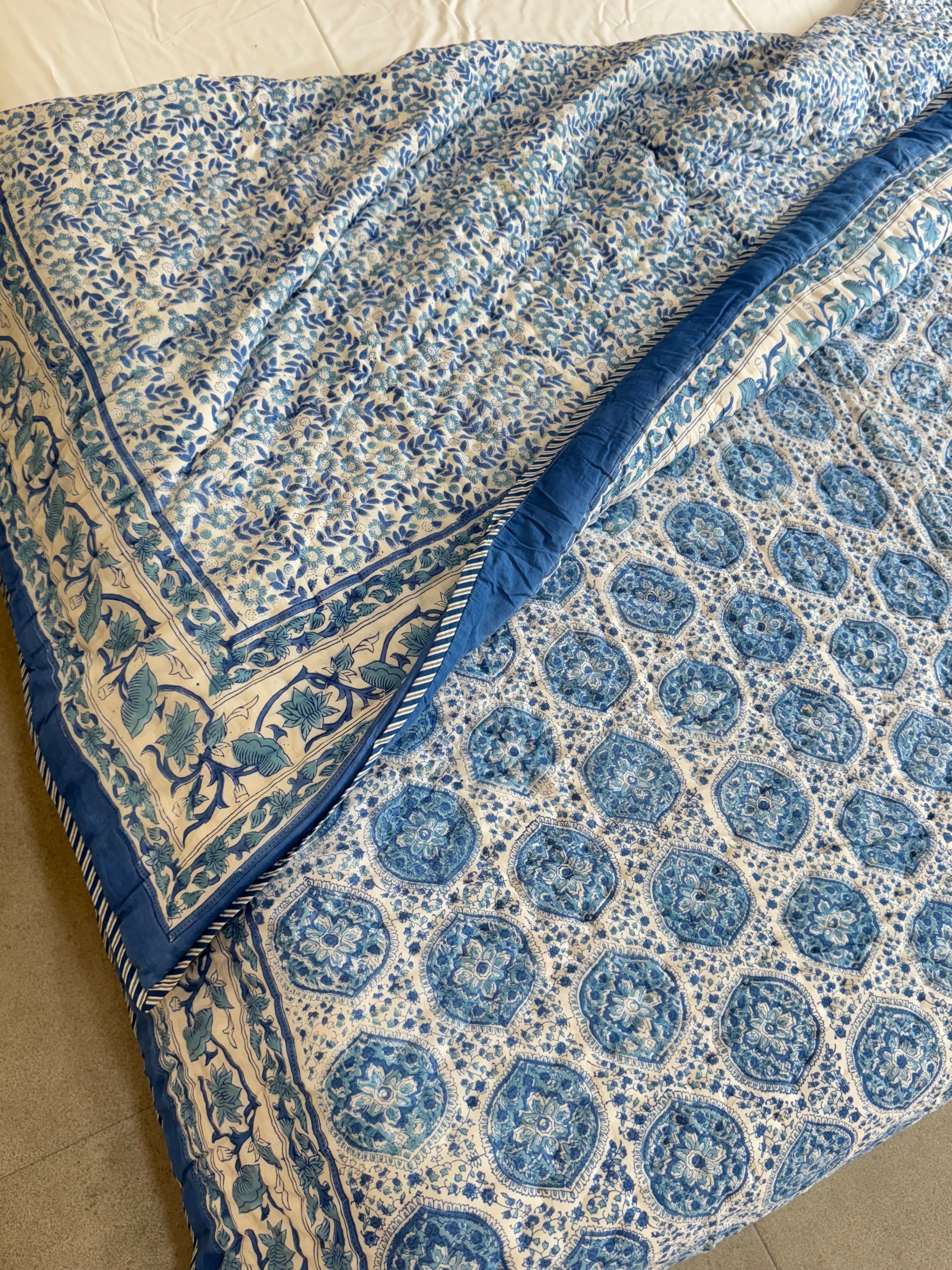FESTIVE HAND BLOCK PRINTED REVERSIBLE QUILT (DOUBLE BED)