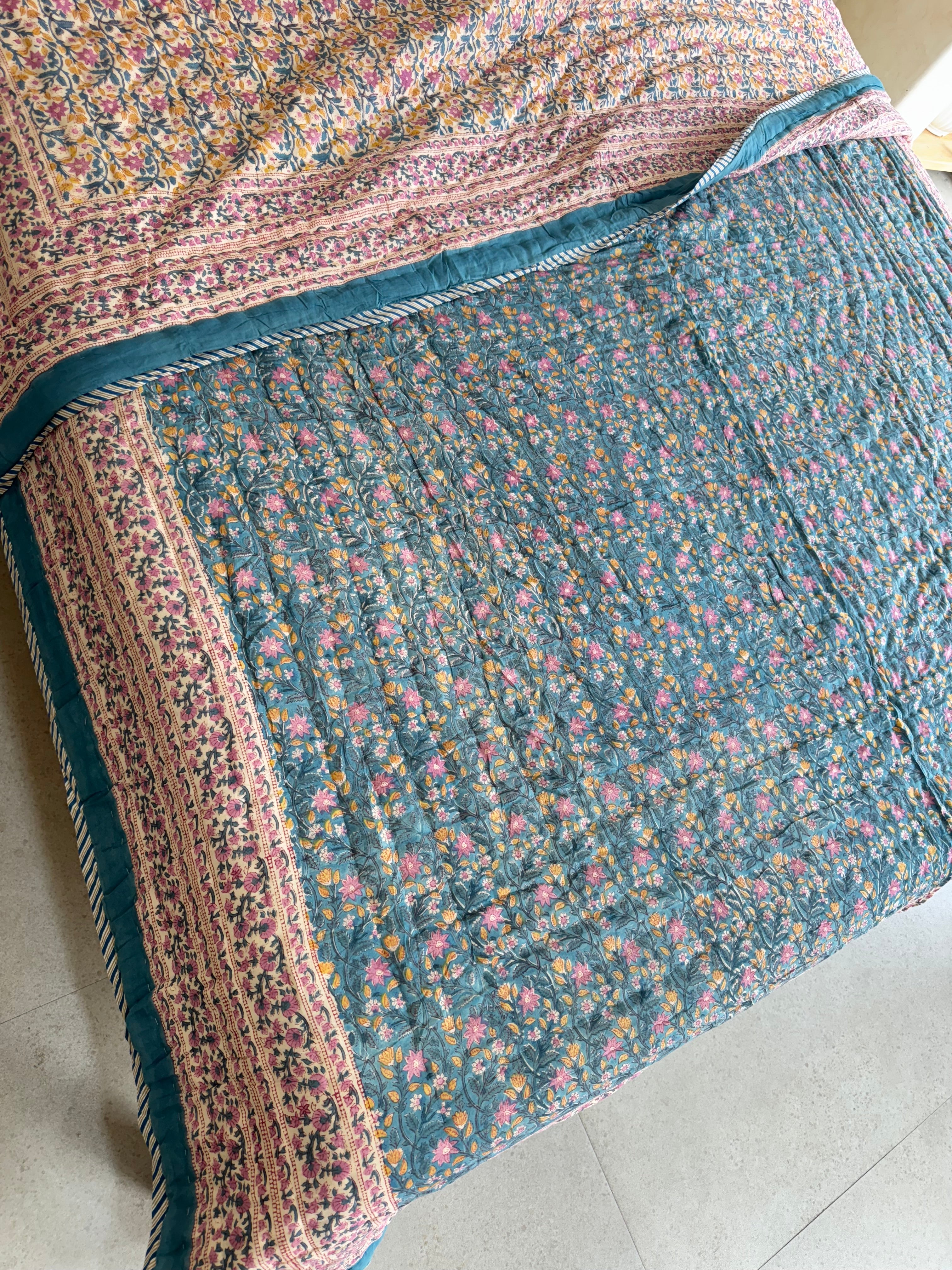 FESTIVE HAND BLOCK PRINTED REVERSIBLE QUILT (DOUBLE BED)