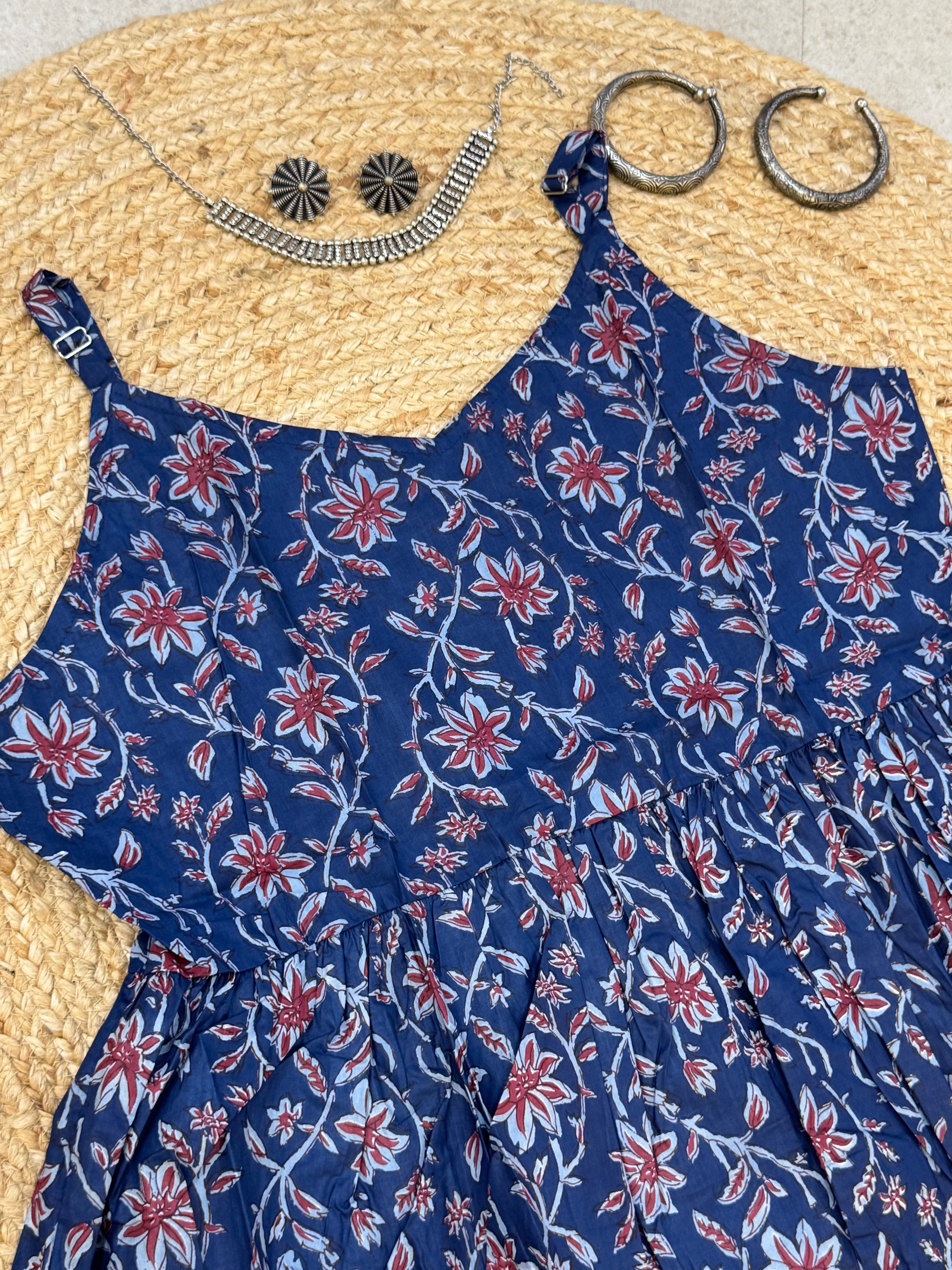 SLEEVELESS PEPLUM STYLE COTTON TOP