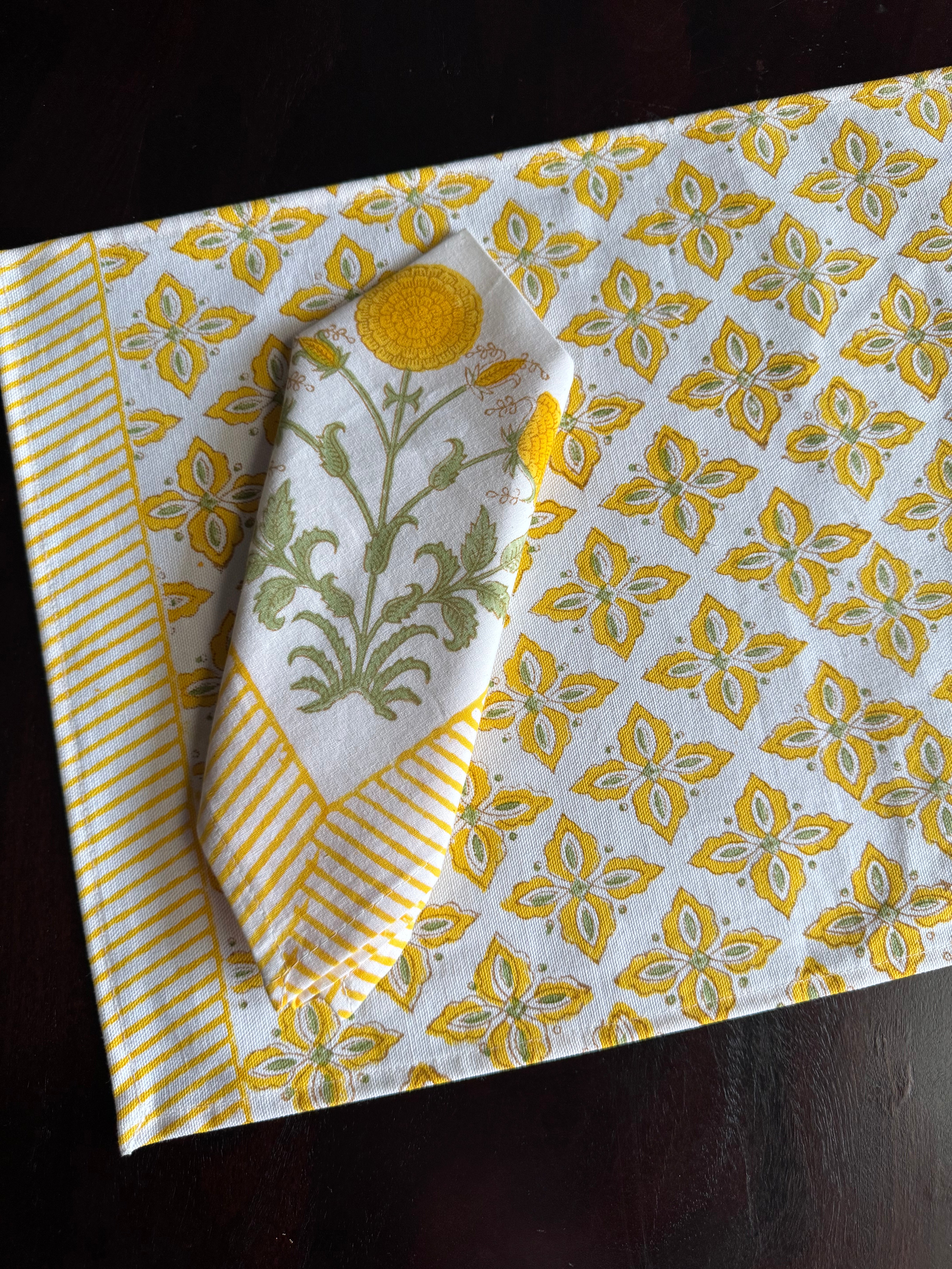 A PAIR OF HANDBLOCK PRINTED TABLE MAT AND NAPKIN SET