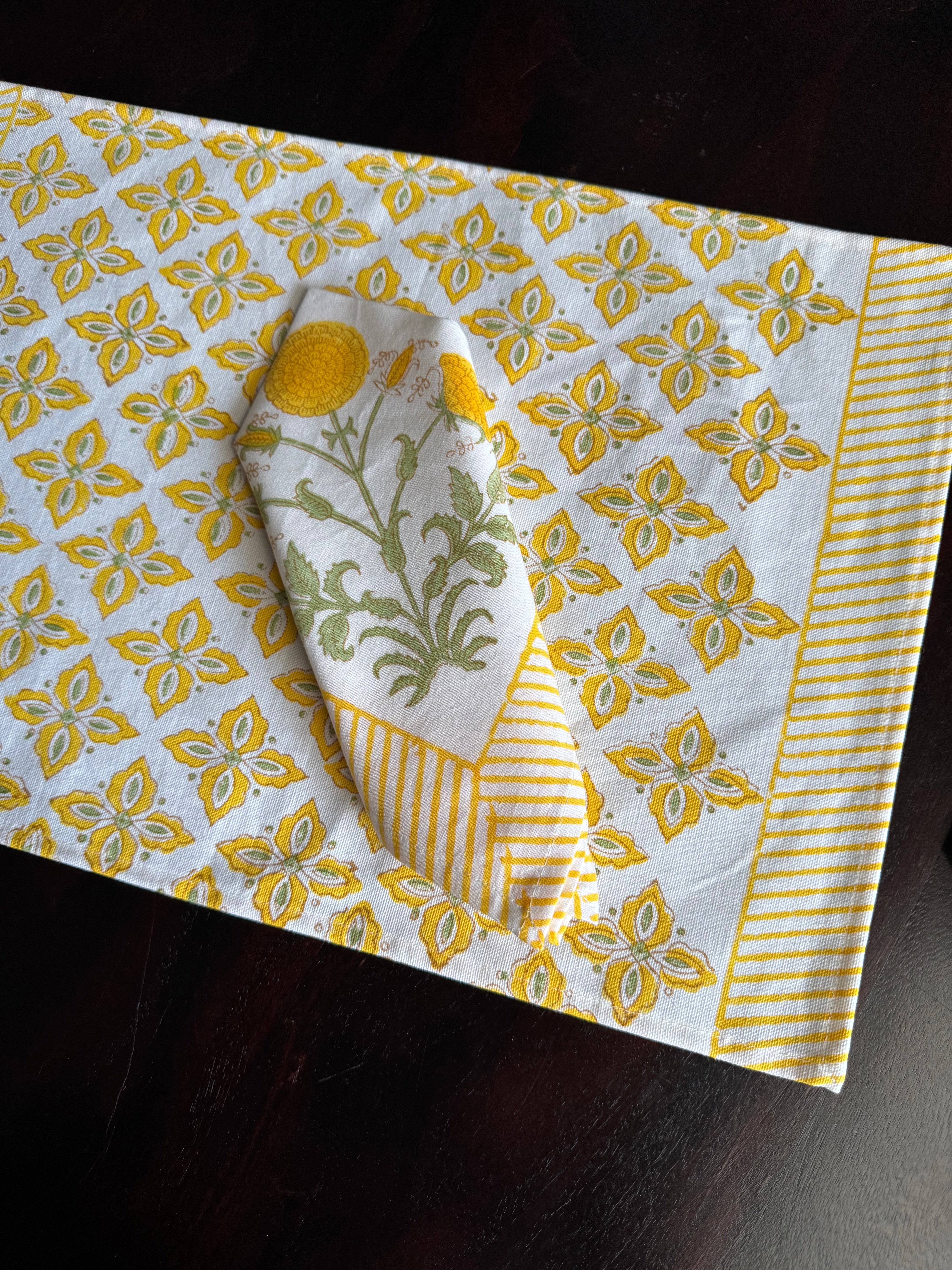 A PAIR OF HANDBLOCK PRINTED TABLE MAT AND NAPKIN SET