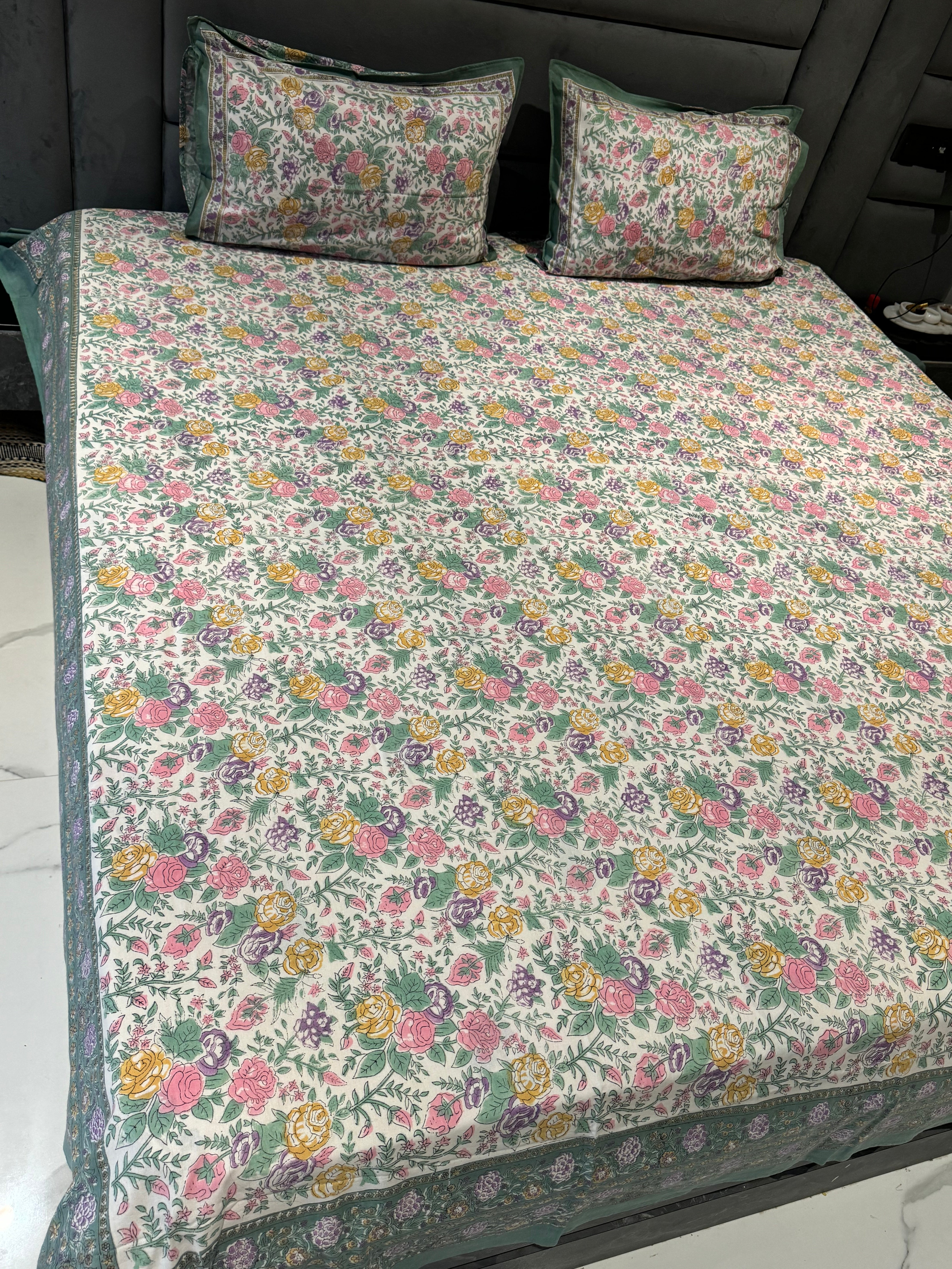 FESTIVE HANDBLOCK PRINTED BEDSHEET WITH 2 REVERSIBLE PILLOW COVERS