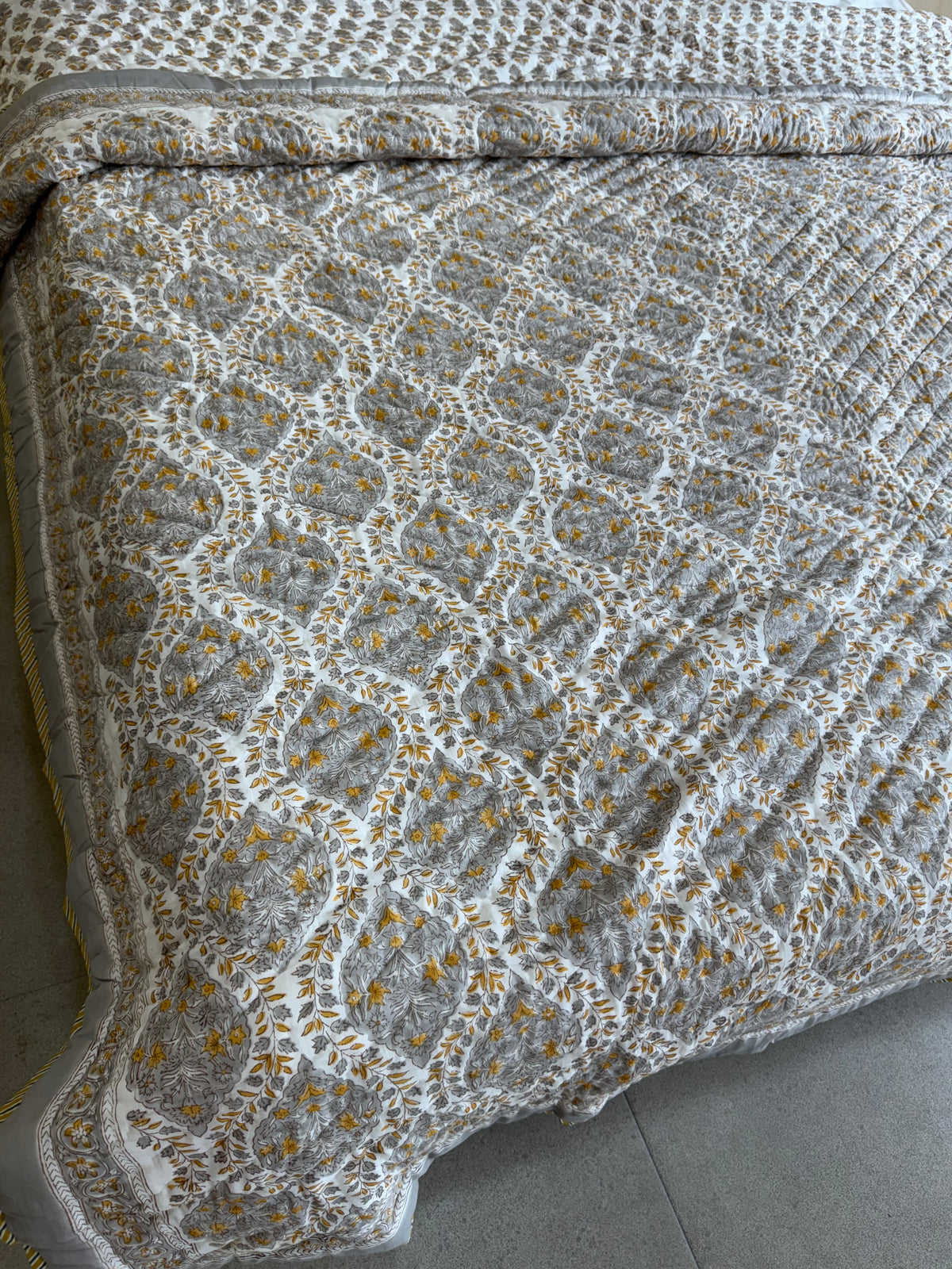 FESTIVE HAND BLOCK PRINTED REVERSIBLE QUILT (DOUBLE BED)