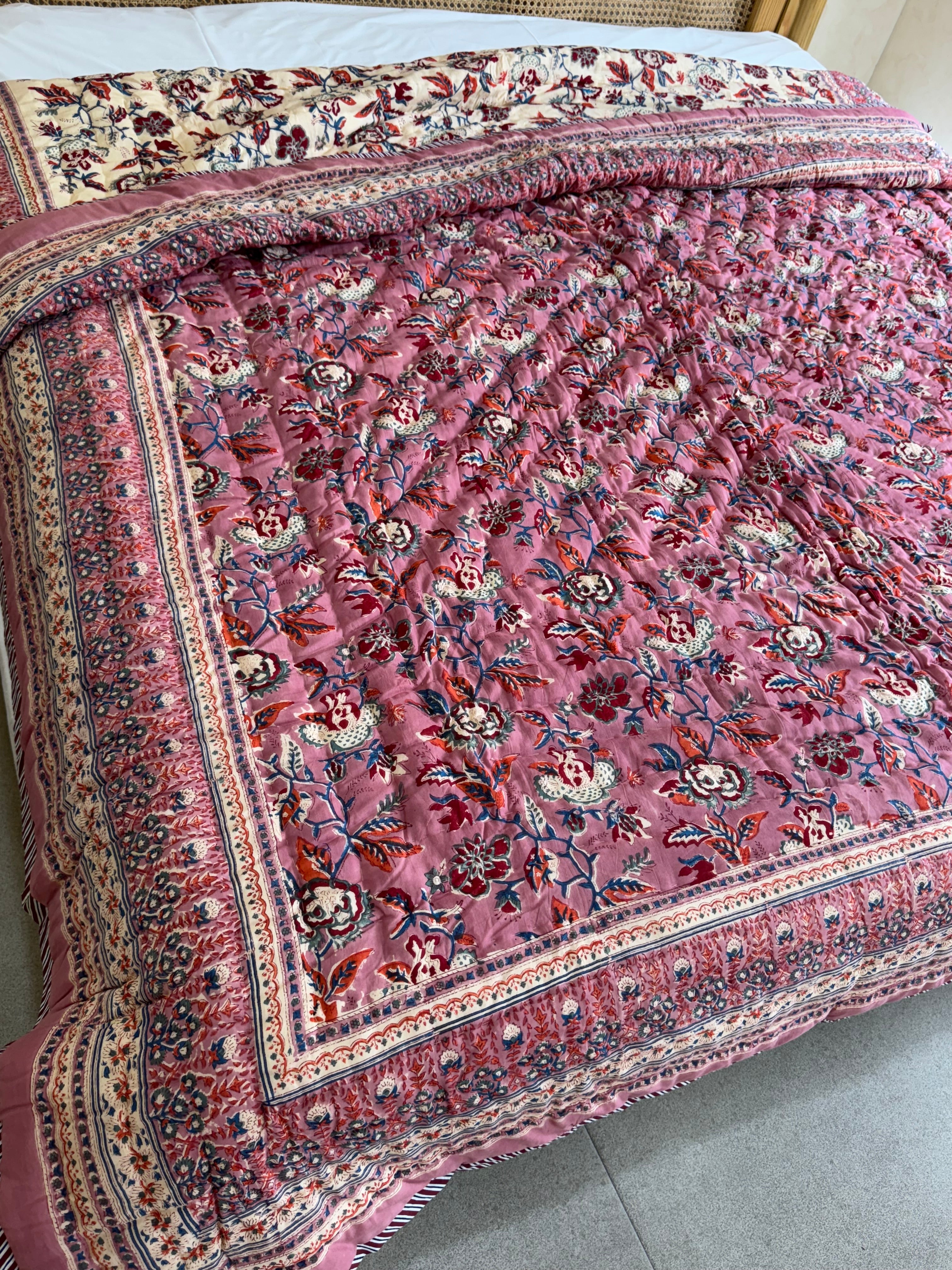 FESTIVE HAND BLOCK PRINTED REVERSIBLE QUILT (DOUBLE BED)