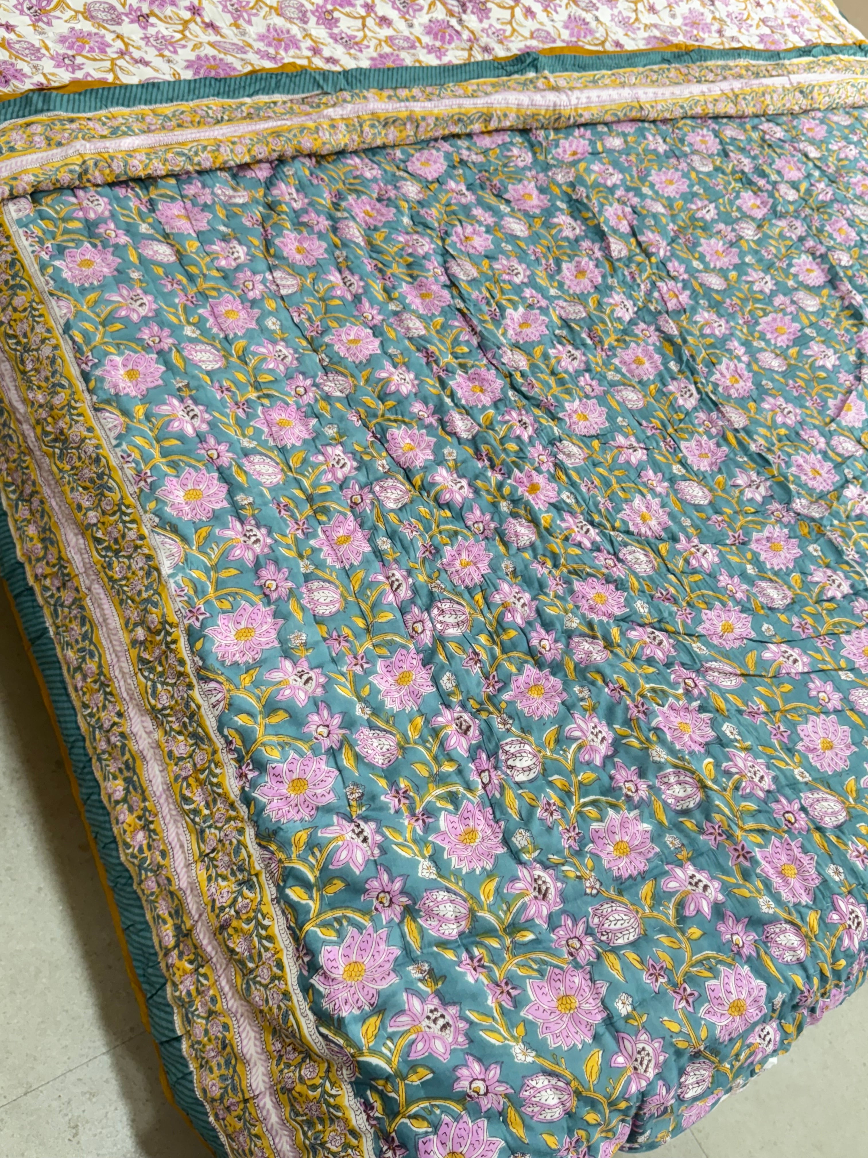 FESTIVE HAND BLOCK PRINTED REVERSIBLE QUILT (SINGLE BED)