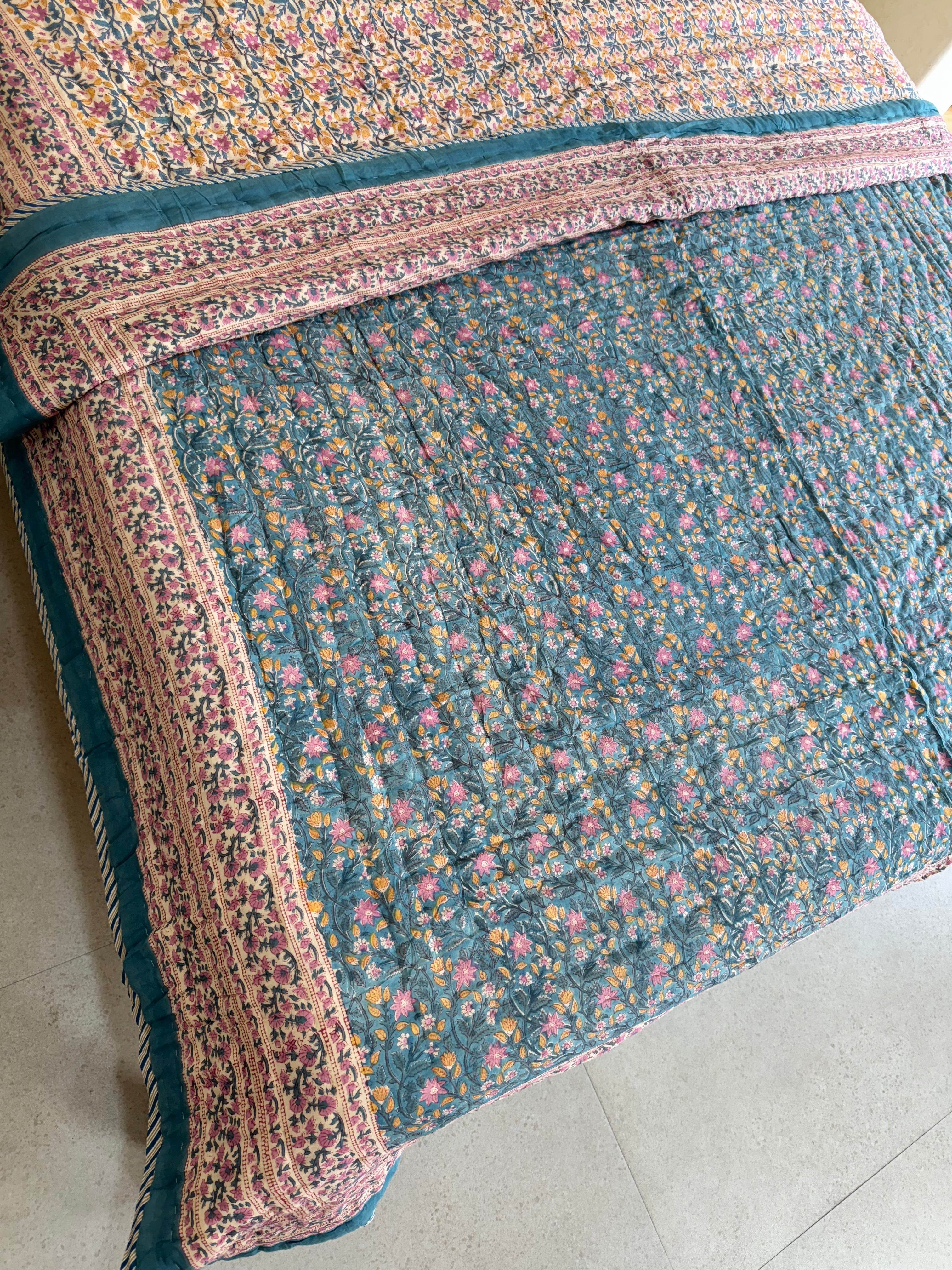 FESTIVE HAND BLOCK PRINTED REVERSIBLE QUILT (DOUBLE BED)