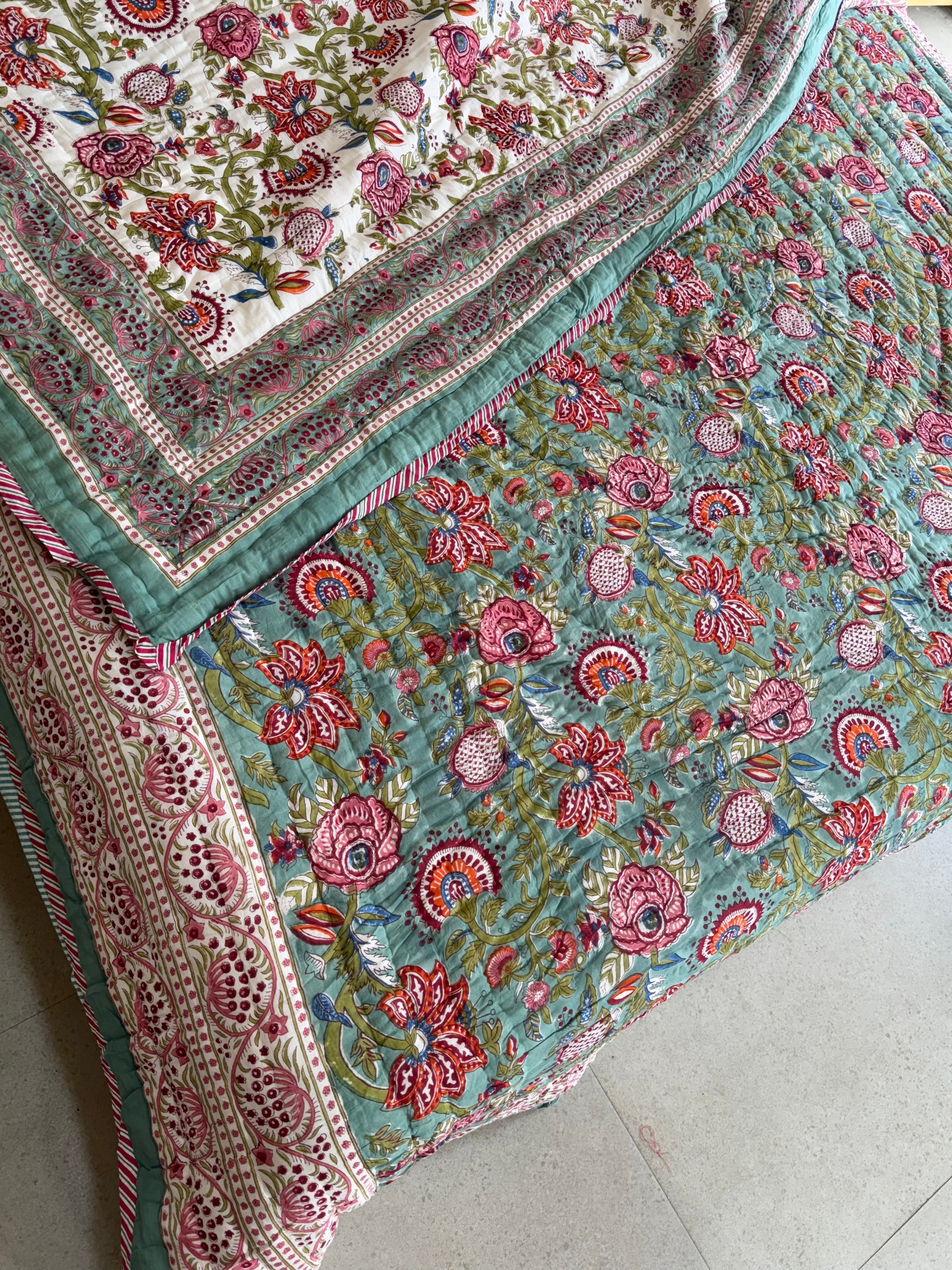 FESTIVE HAND BLOCK PRINTED REVERSIBLE QUILT (DOUBLE BED)