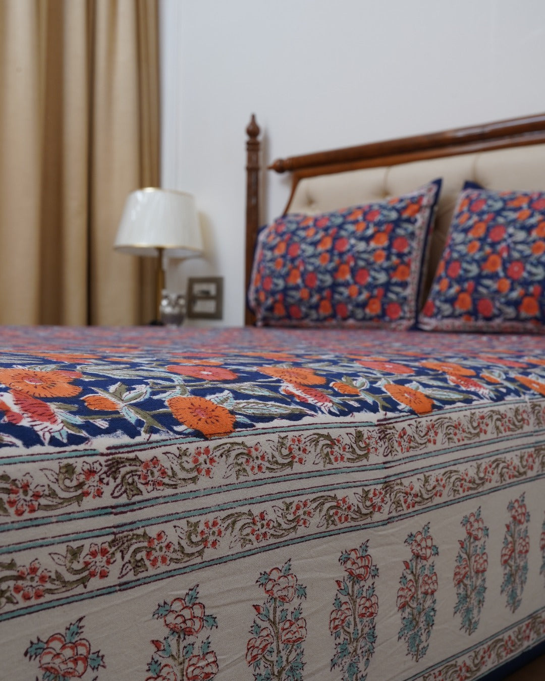 FESTIVE HANDBLOCK PRINTED BEDSHEET WITH 2 REVERSIBLE PILLOW COVERS
