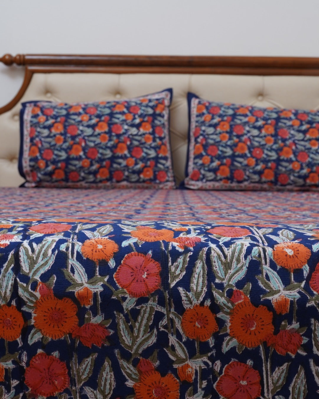 FESTIVE HANDBLOCK PRINTED BEDSHEET WITH 2 REVERSIBLE PILLOW COVERS