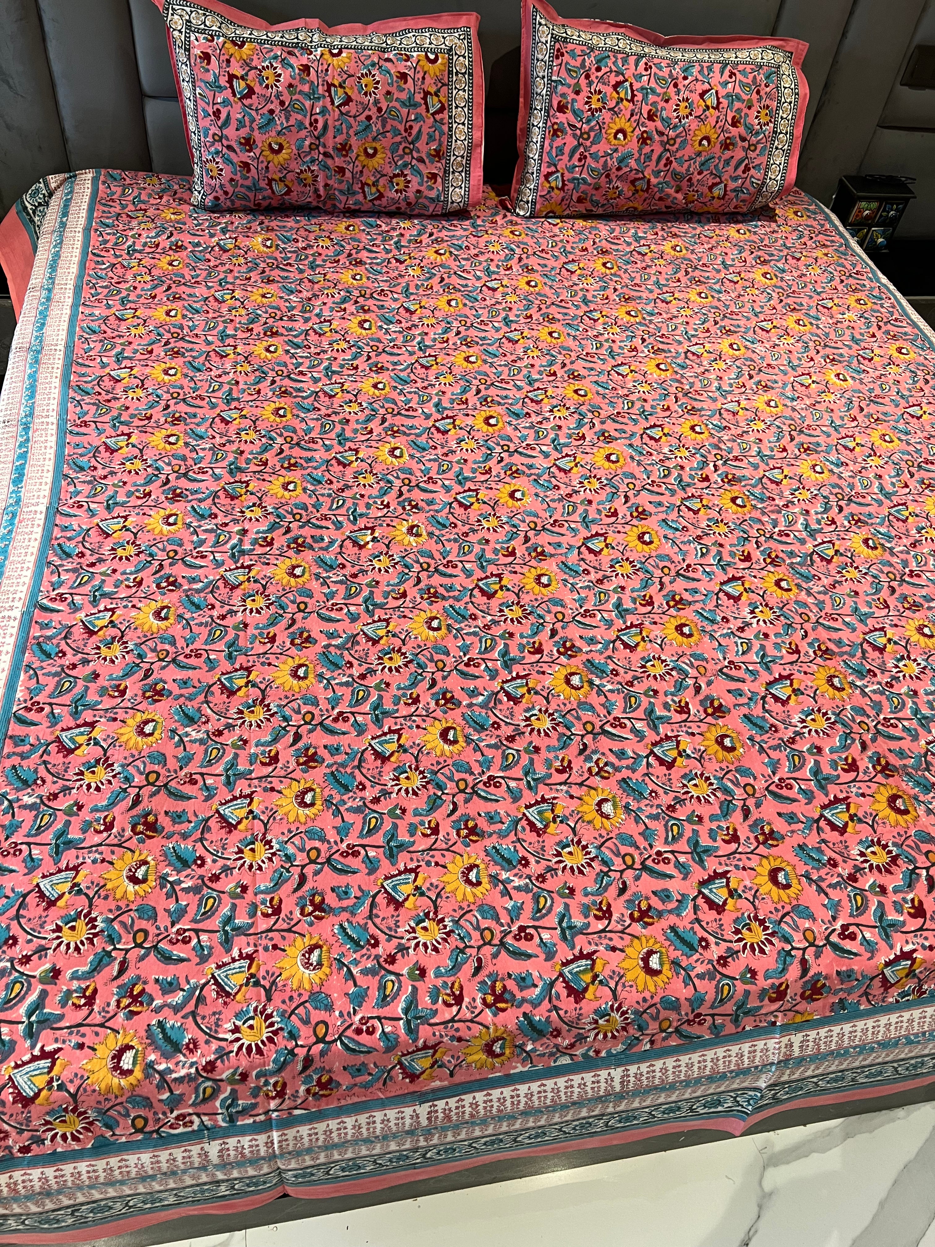 FESTIVE HANDBLOCK PRINTED BEDSHEET WITH 2 REVERSIBLE PILLOW COVERS