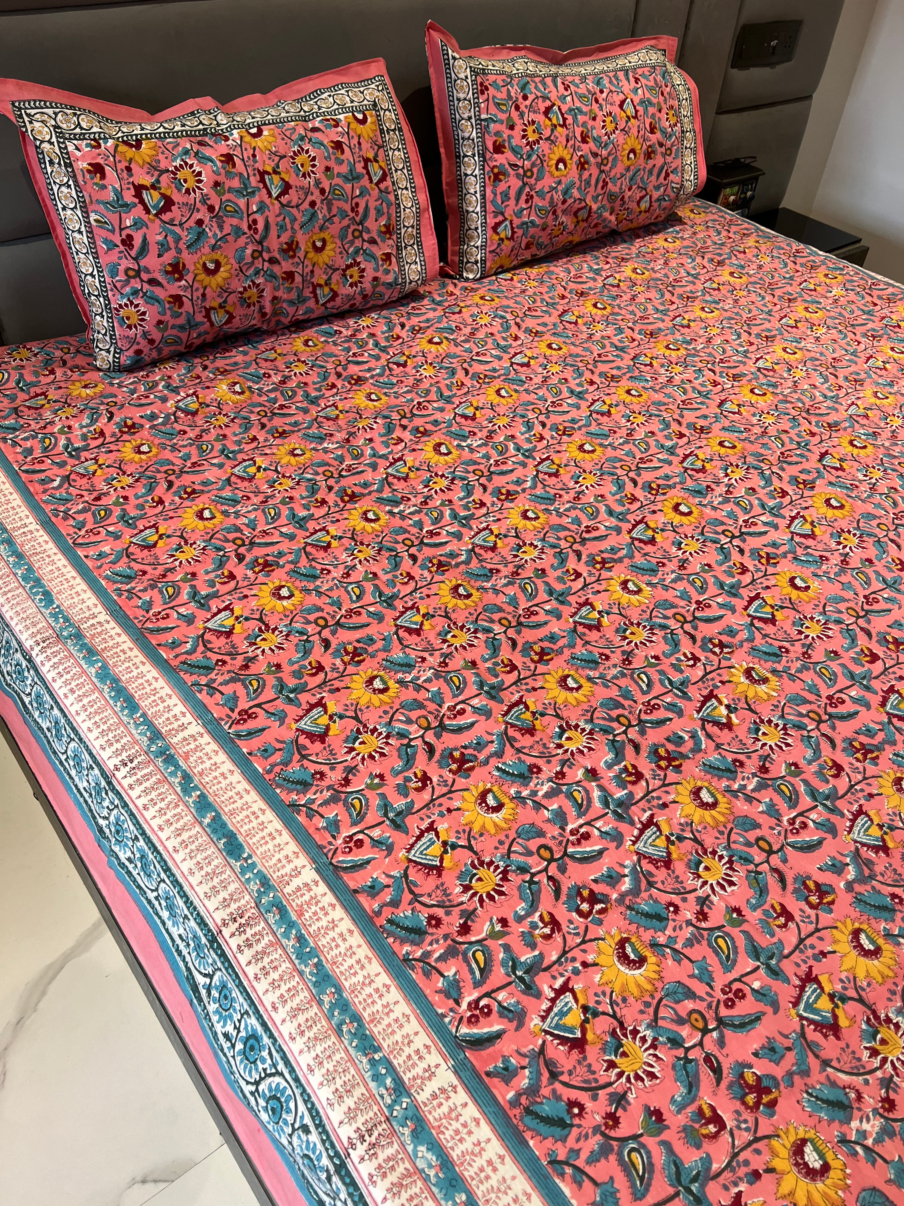 FESTIVE HANDBLOCK PRINTED BEDSHEET WITH 2 REVERSIBLE PILLOW COVERS