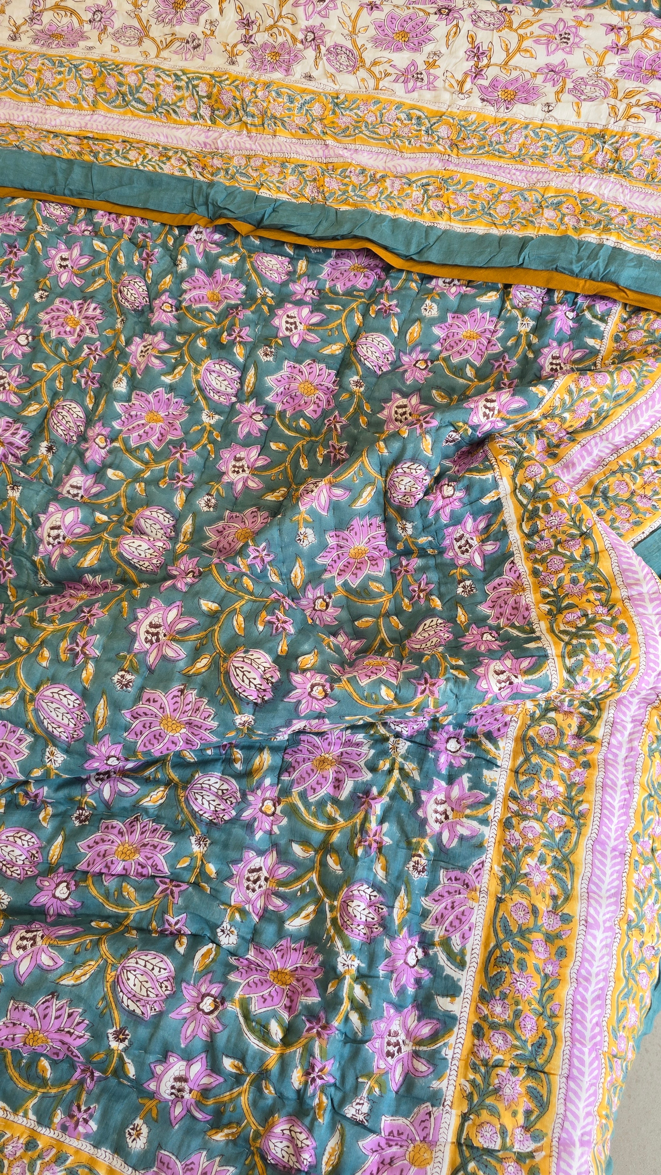 FESTIVE HAND BLOCK PRINTED REVERSIBLE QUILT (SINGLE BED)