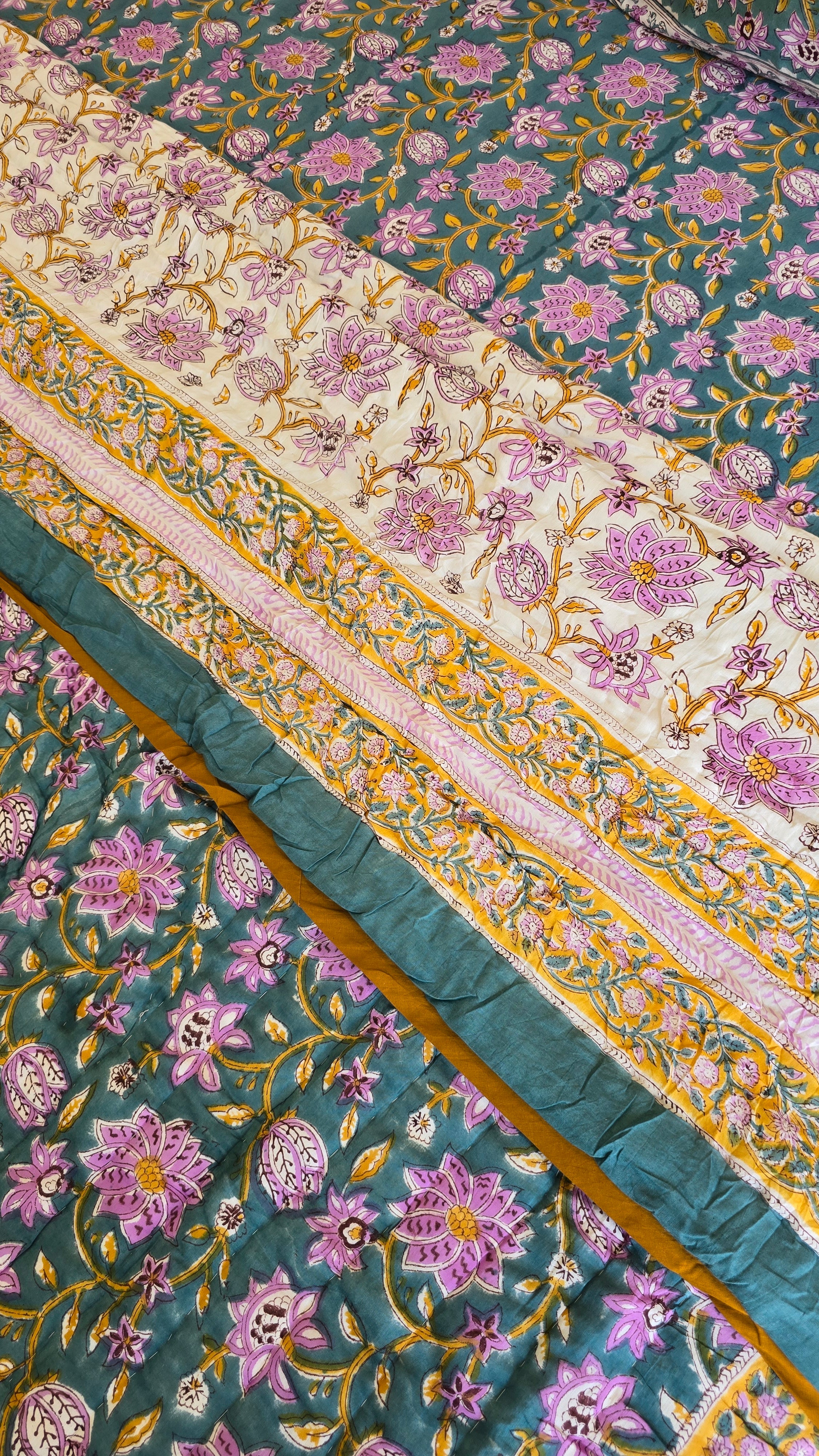 FESTIVE HAND BLOCK PRINTED REVERSIBLE QUILT (SINGLE BED)