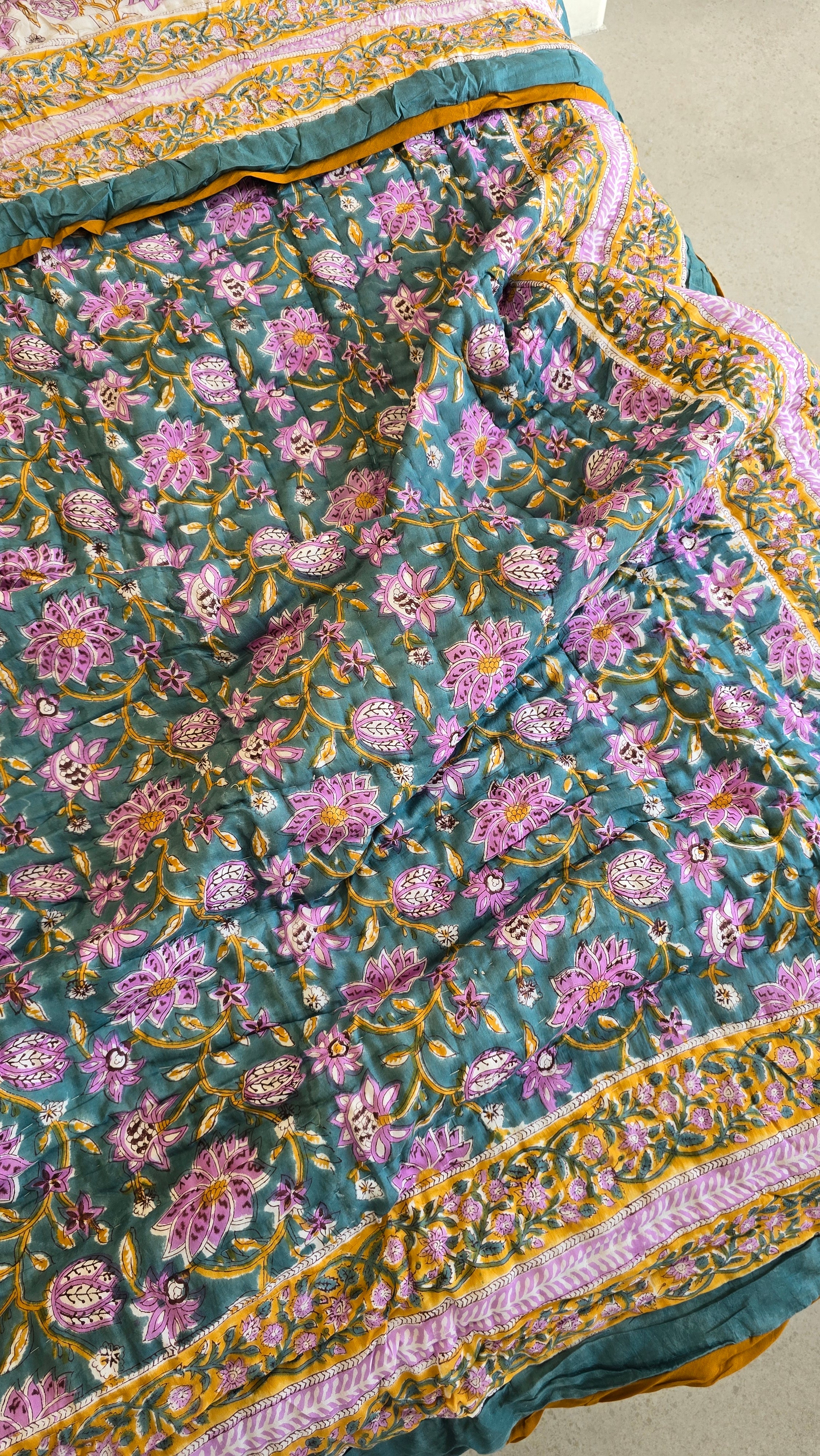 FESTIVE HAND BLOCK PRINTED REVERSIBLE QUILT (SINGLE BED)