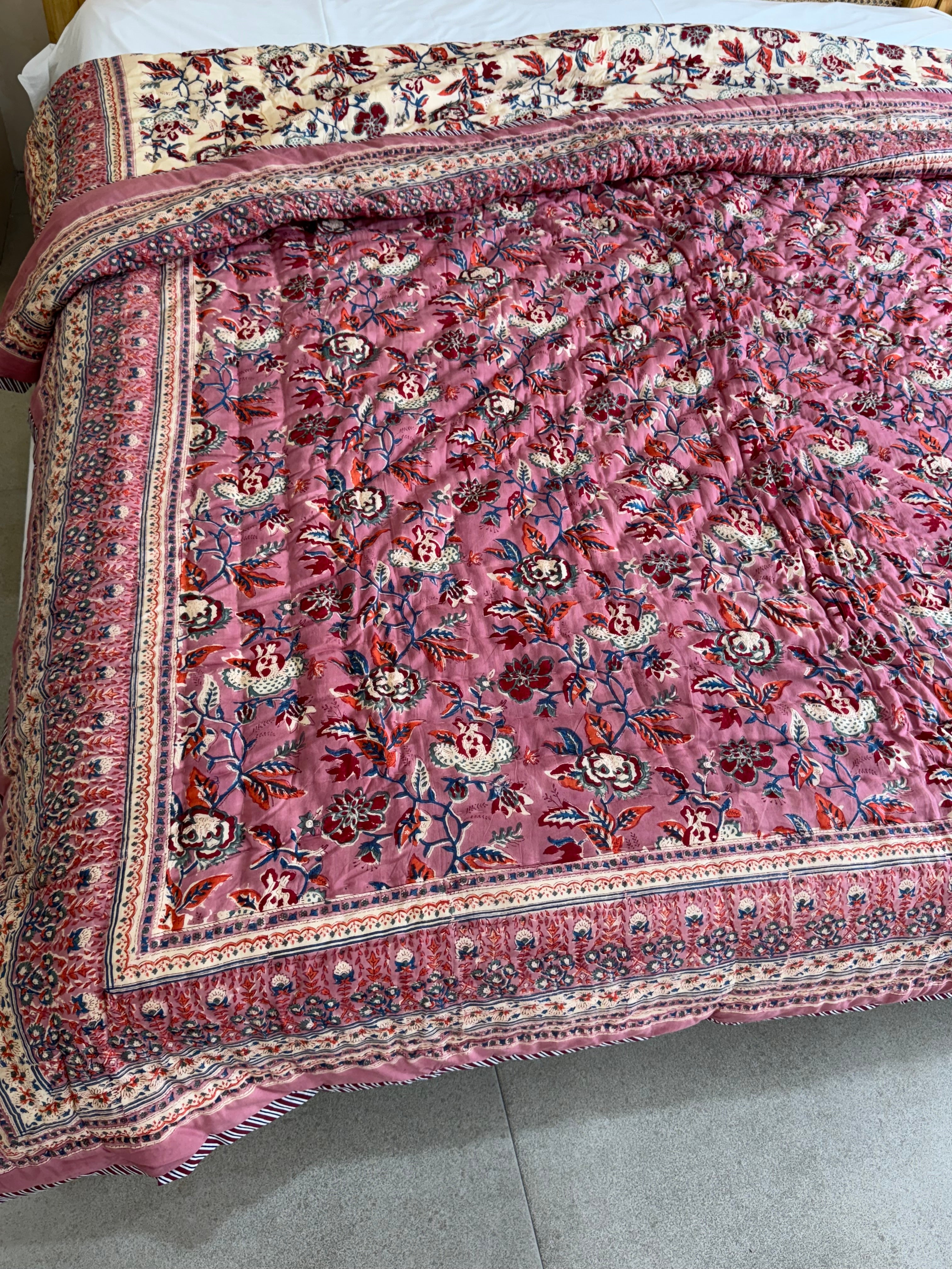 FESTIVE HAND BLOCK PRINTED REVERSIBLE QUILT (DOUBLE BED)
