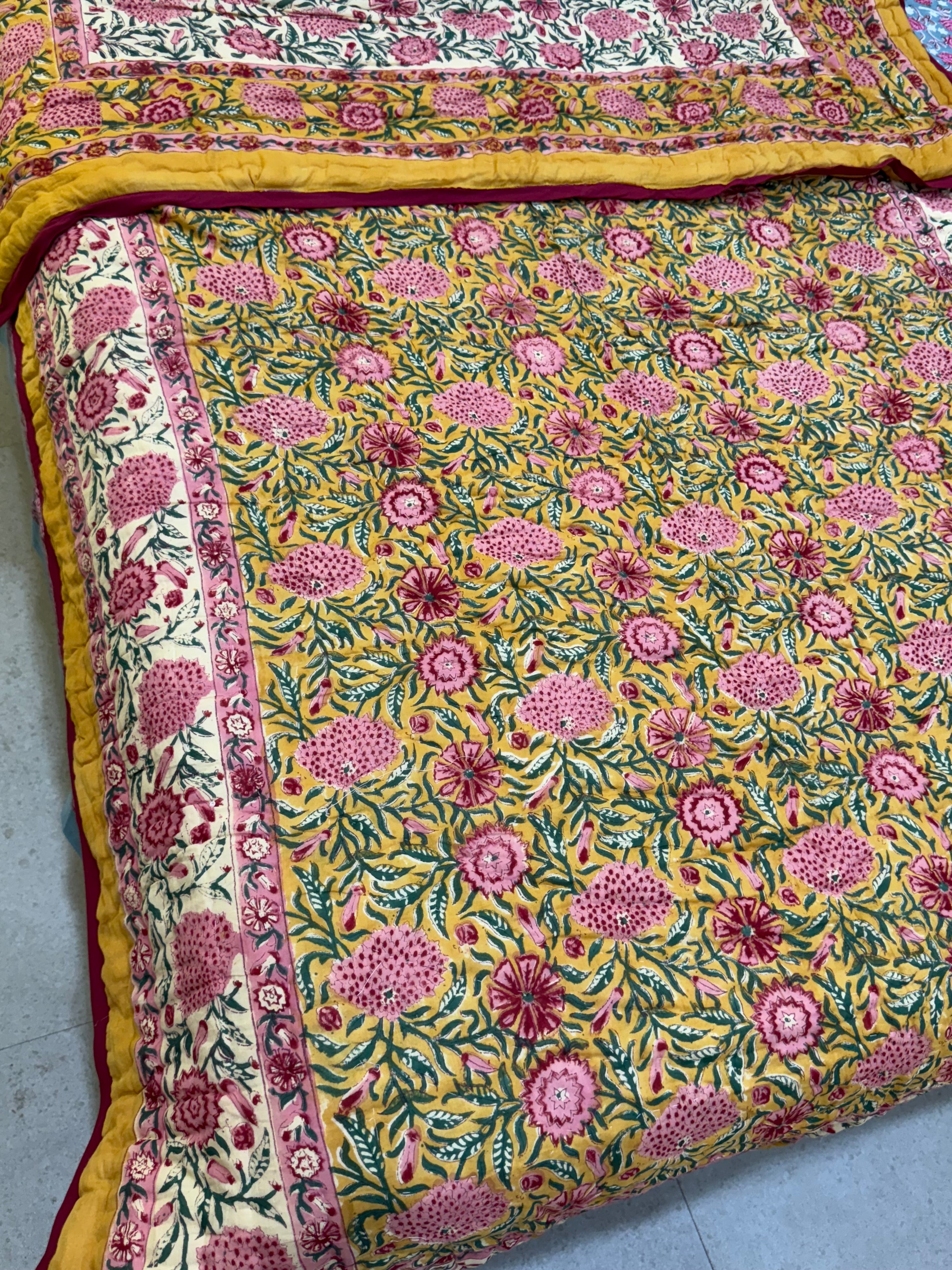 FESTIVE HAND BLOCK PRINTED REVERSIBLE QUILT (SINGLE BED)