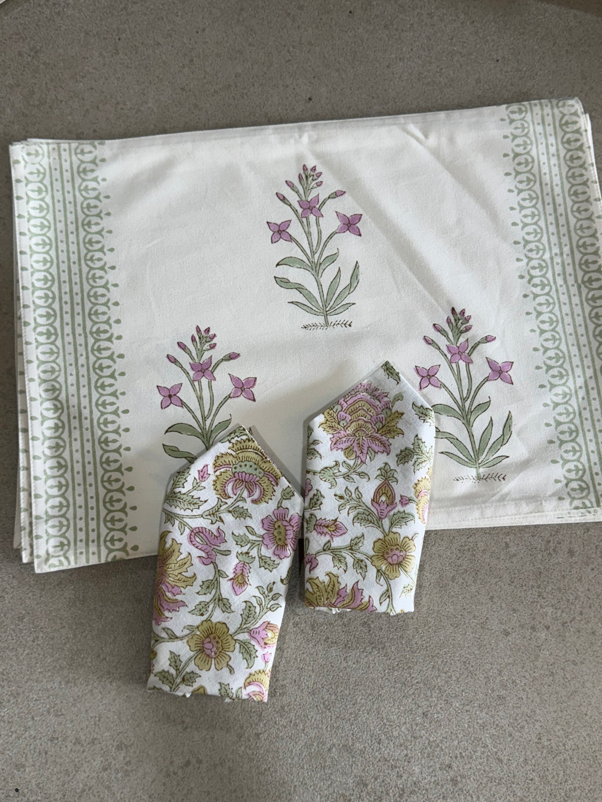A PAIR OF HANDBLOCK PRINTED TABLE MAT AND NAPKIN SET
