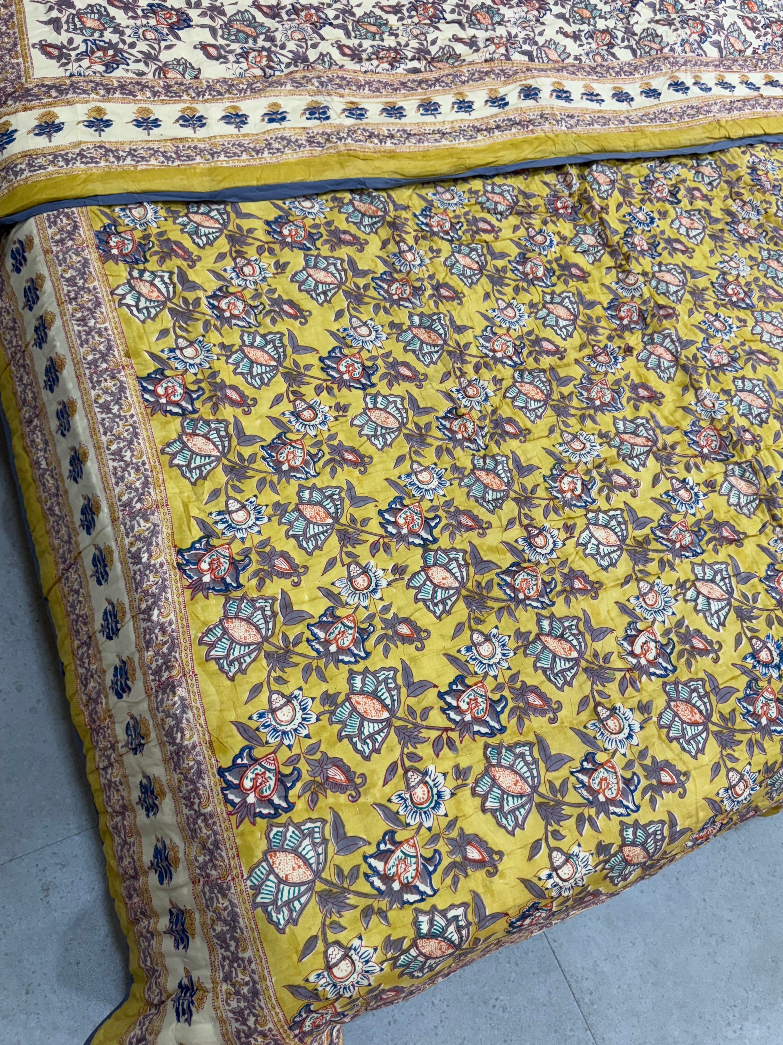 FESTIVE HAND BLOCK PRINTED REVERSIBLE QUILT (DOUBLE BED)