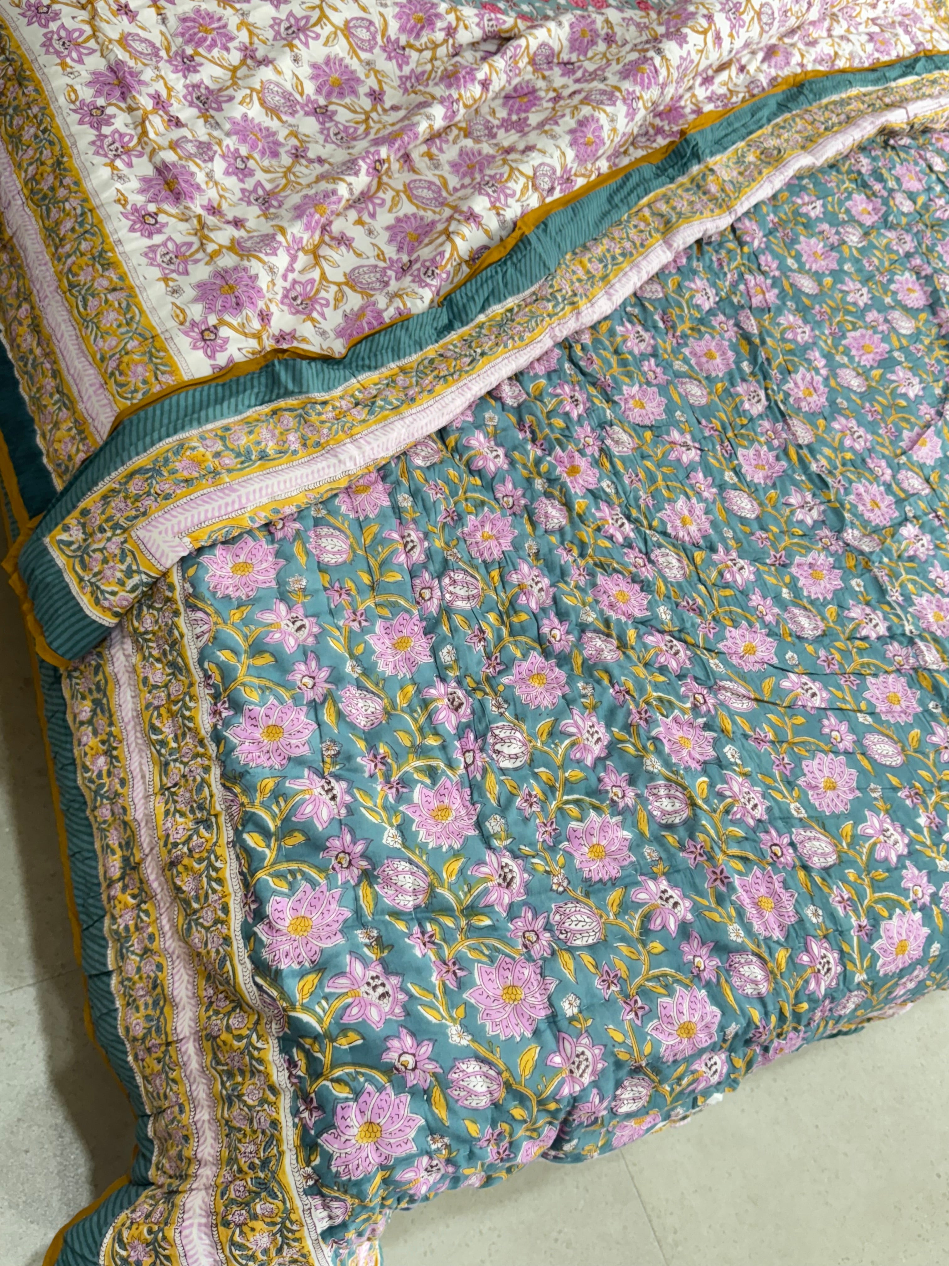 FESTIVE HAND BLOCK PRINTED REVERSIBLE QUILT (SINGLE BED)