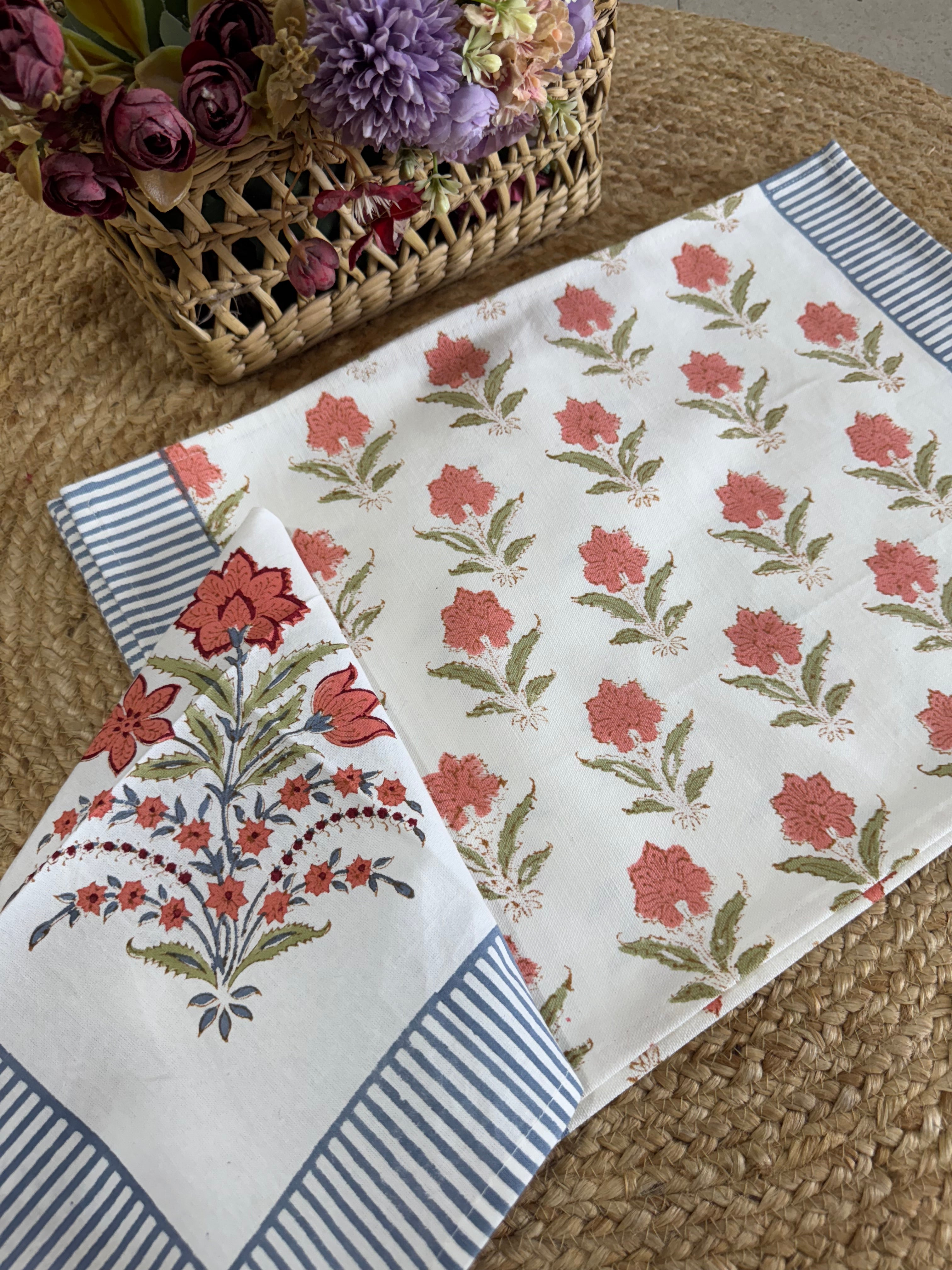 A PAIR OF HANDBLOCK PRINTED TABLE MAT AND NAPKIN SET
