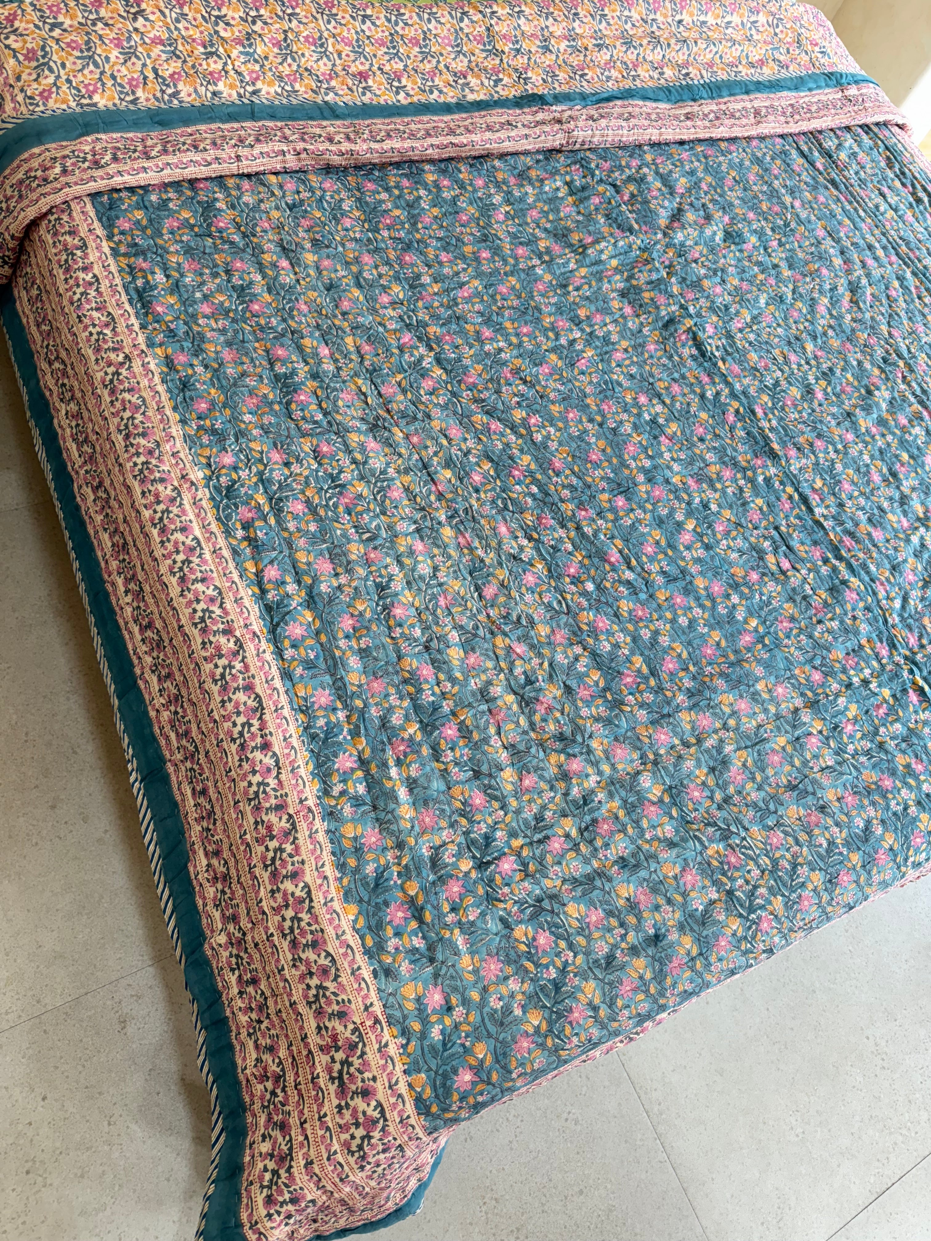 FESTIVE HAND BLOCK PRINTED REVERSIBLE QUILT (DOUBLE BED)