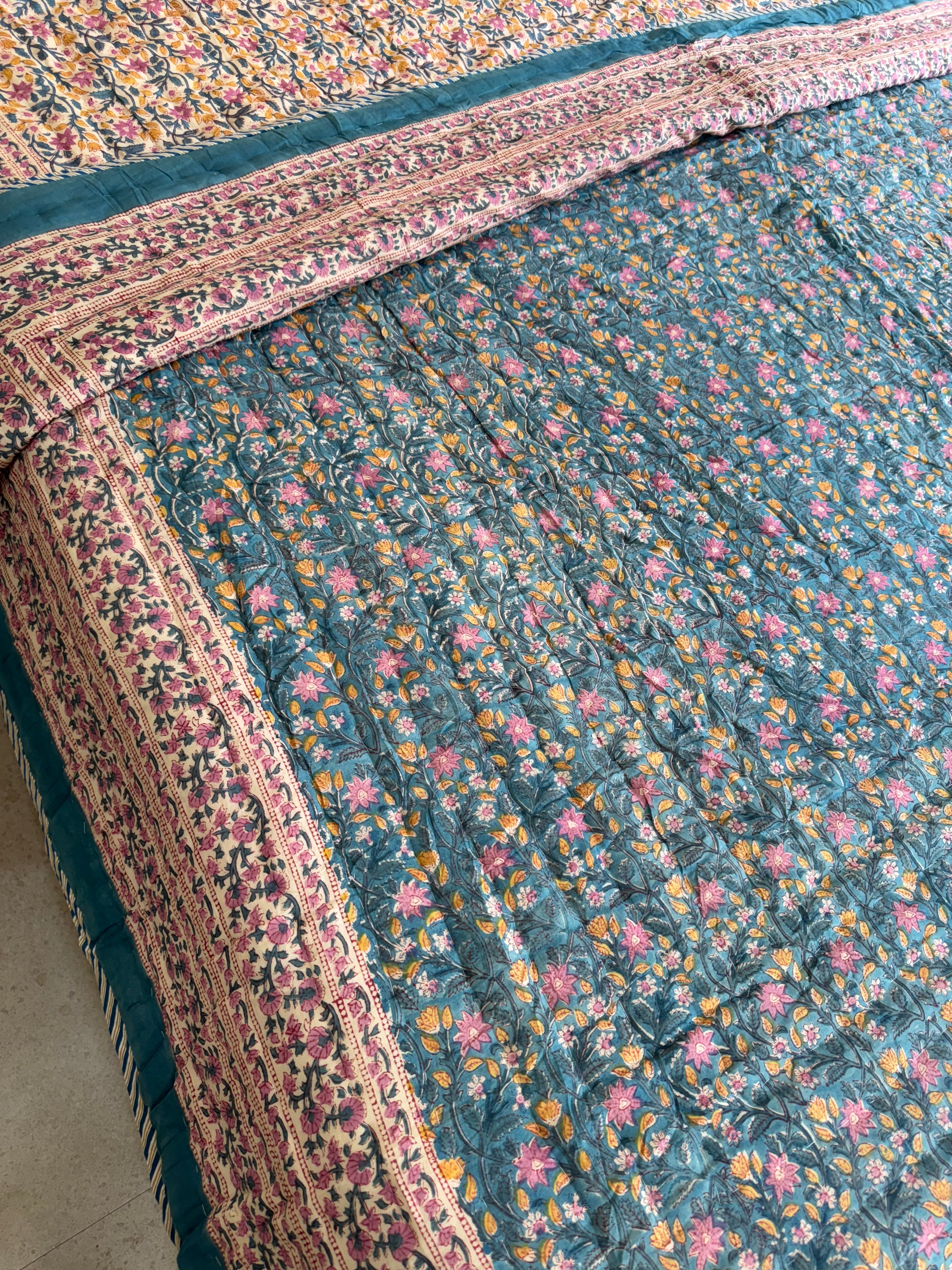 FESTIVE HAND BLOCK PRINTED REVERSIBLE QUILT (DOUBLE BED)