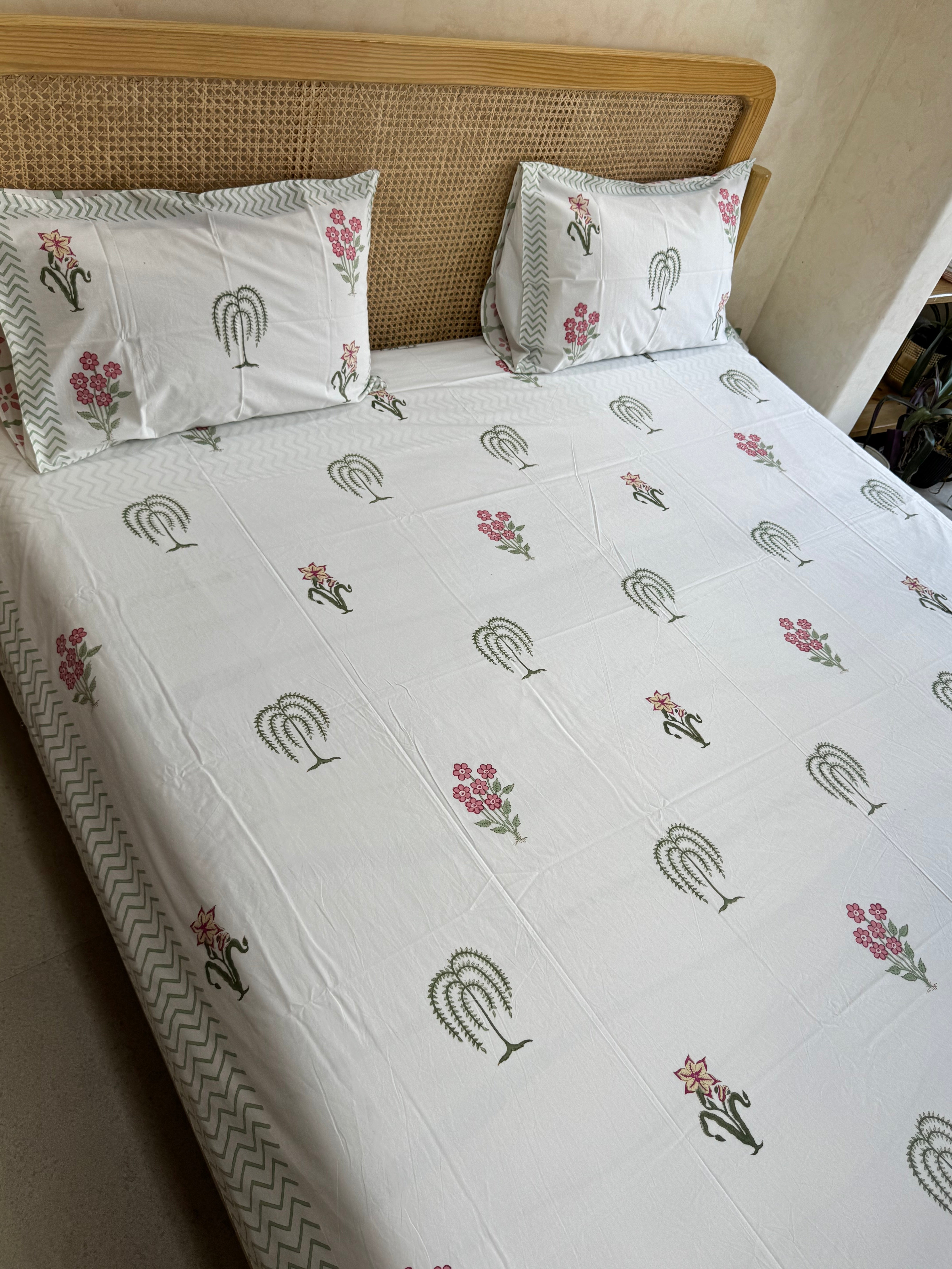 BLUSH BLOOM HAND BLOCK PRINTED BEDSHEET WITH TWO REVERSIBLE PILLOW COVERS