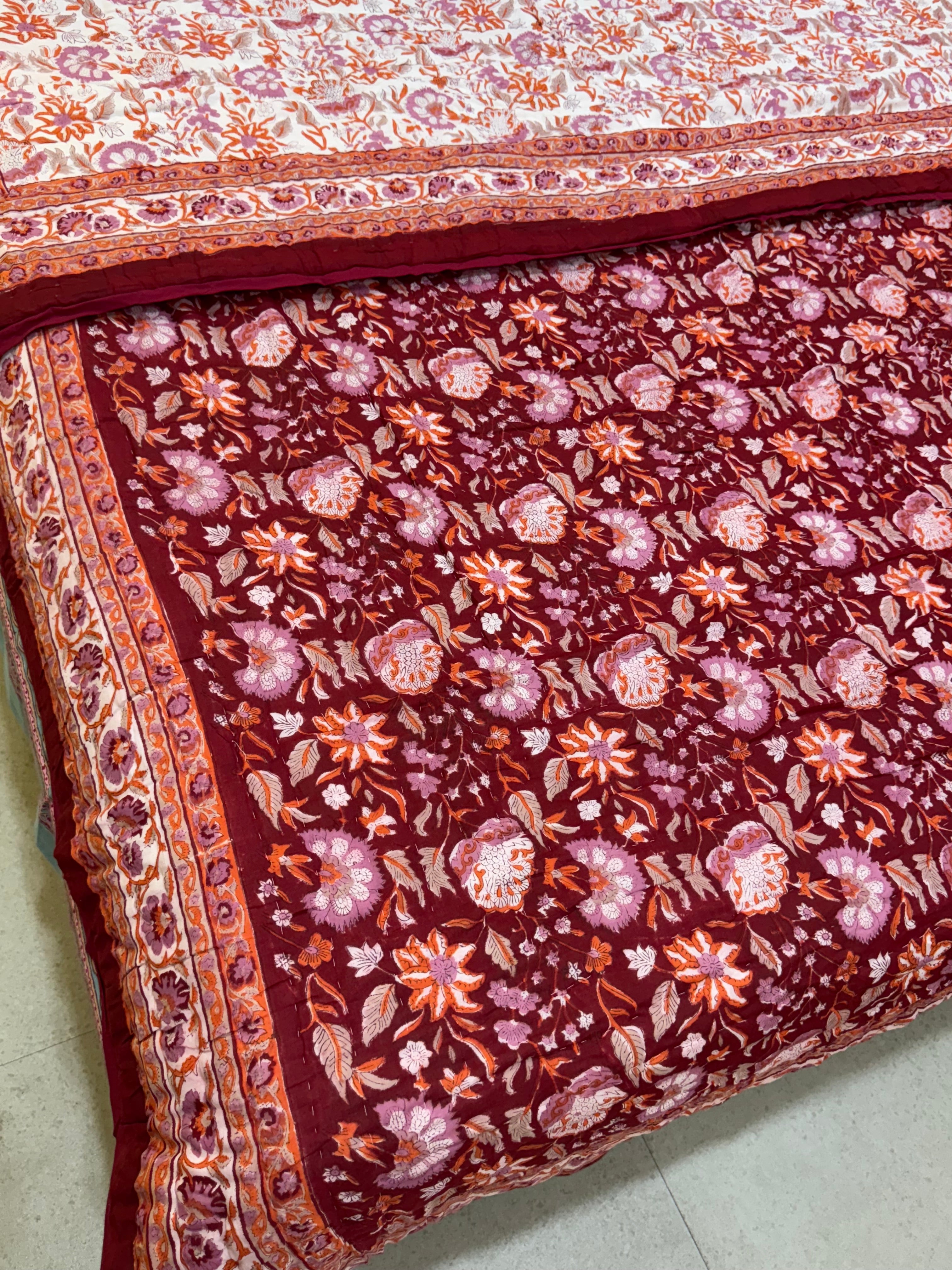 FESTIVE HAND BLOCK PRINTED REVERSIBLE QUILT (SINGLE BED)
