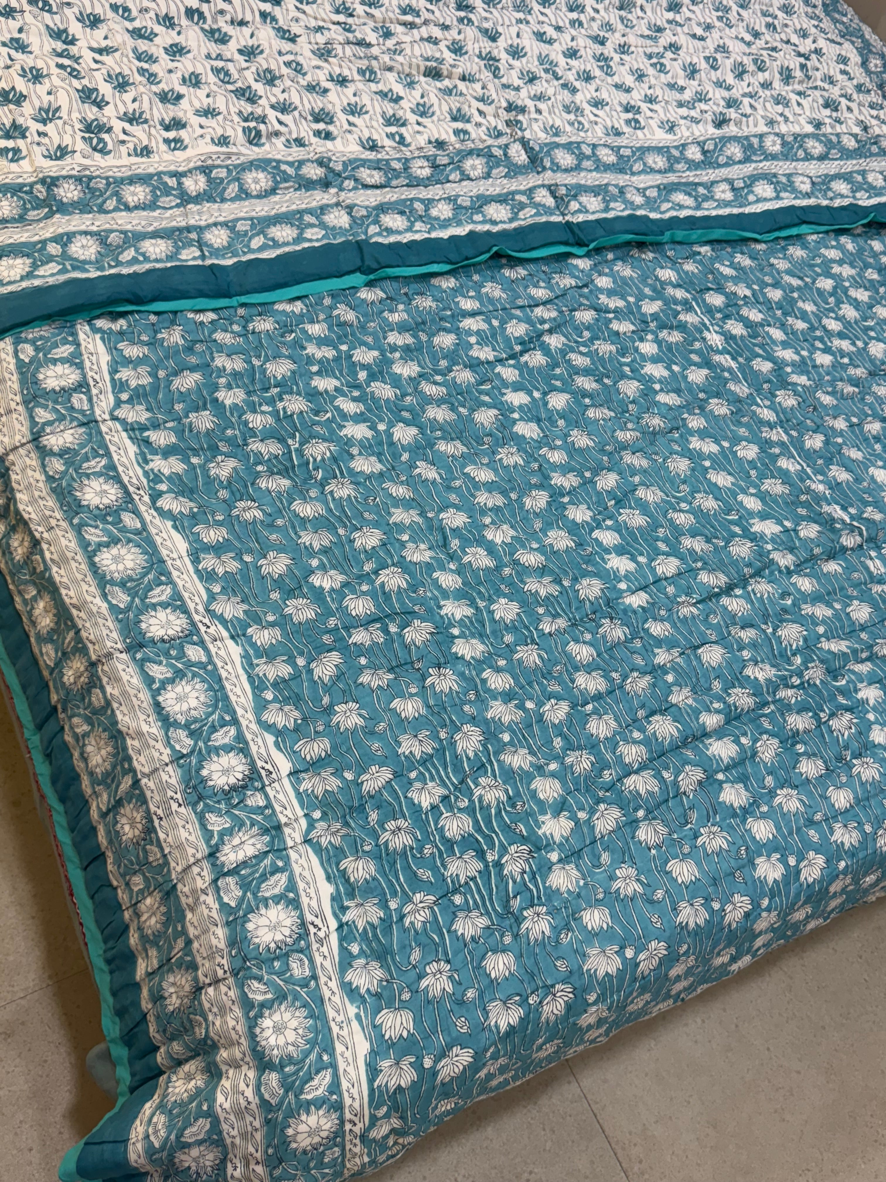 FESTIVE HAND BLOCK PRINTED REVERSIBLE QUILT (DOUBLE BED)