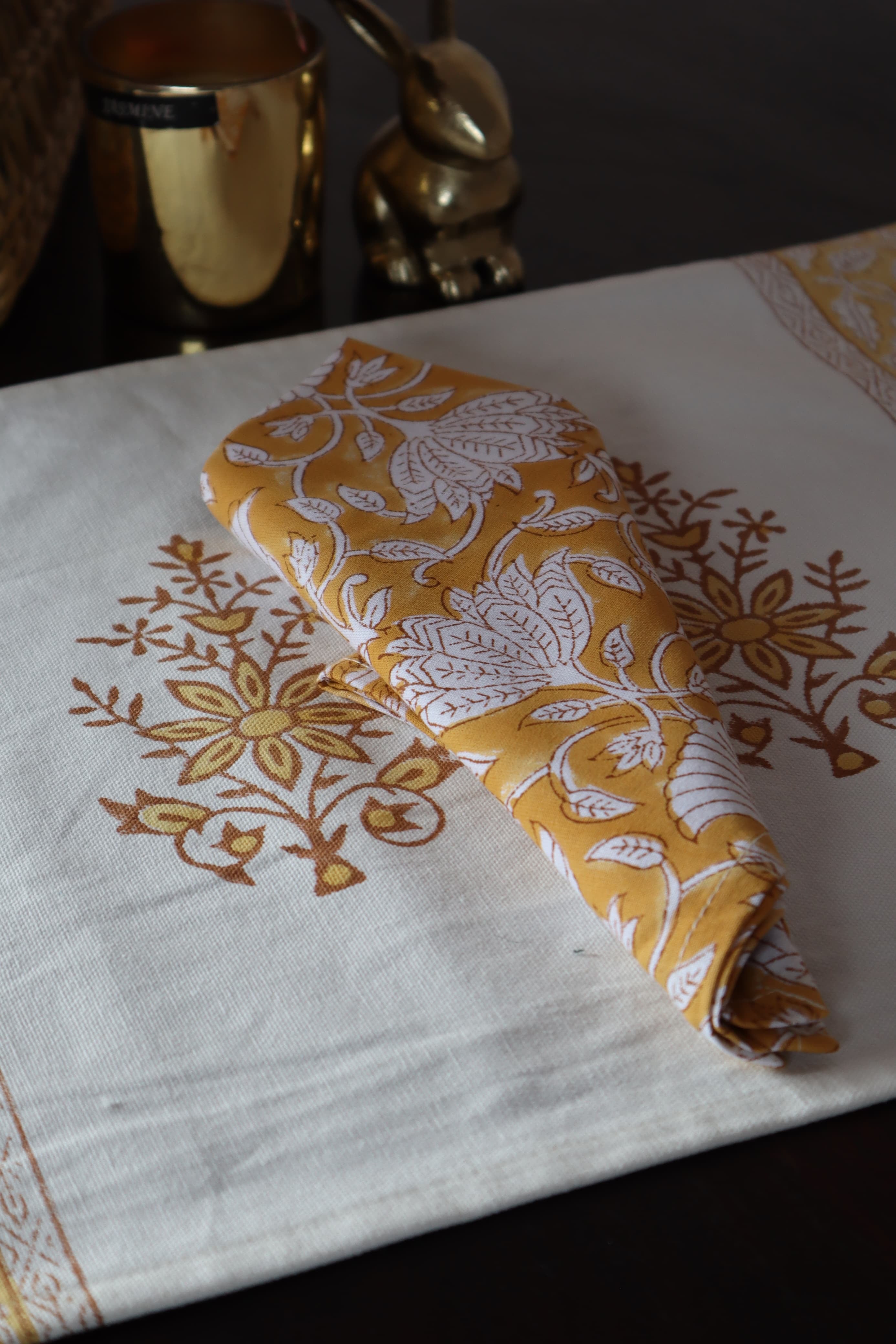 A PAIR OF HANDBLOCK PRINTED TABLE MAT AND NAPKIN SET