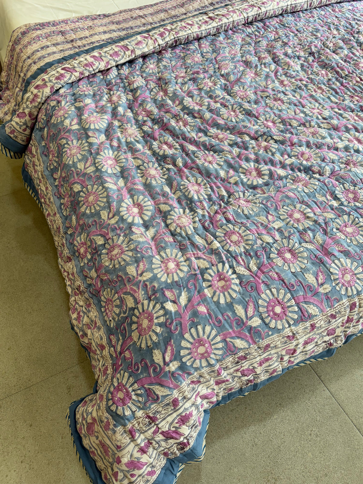 FESTIVE HAND BLOCK PRINTED REVERSIBLE QUILT (DOUBLE BED)