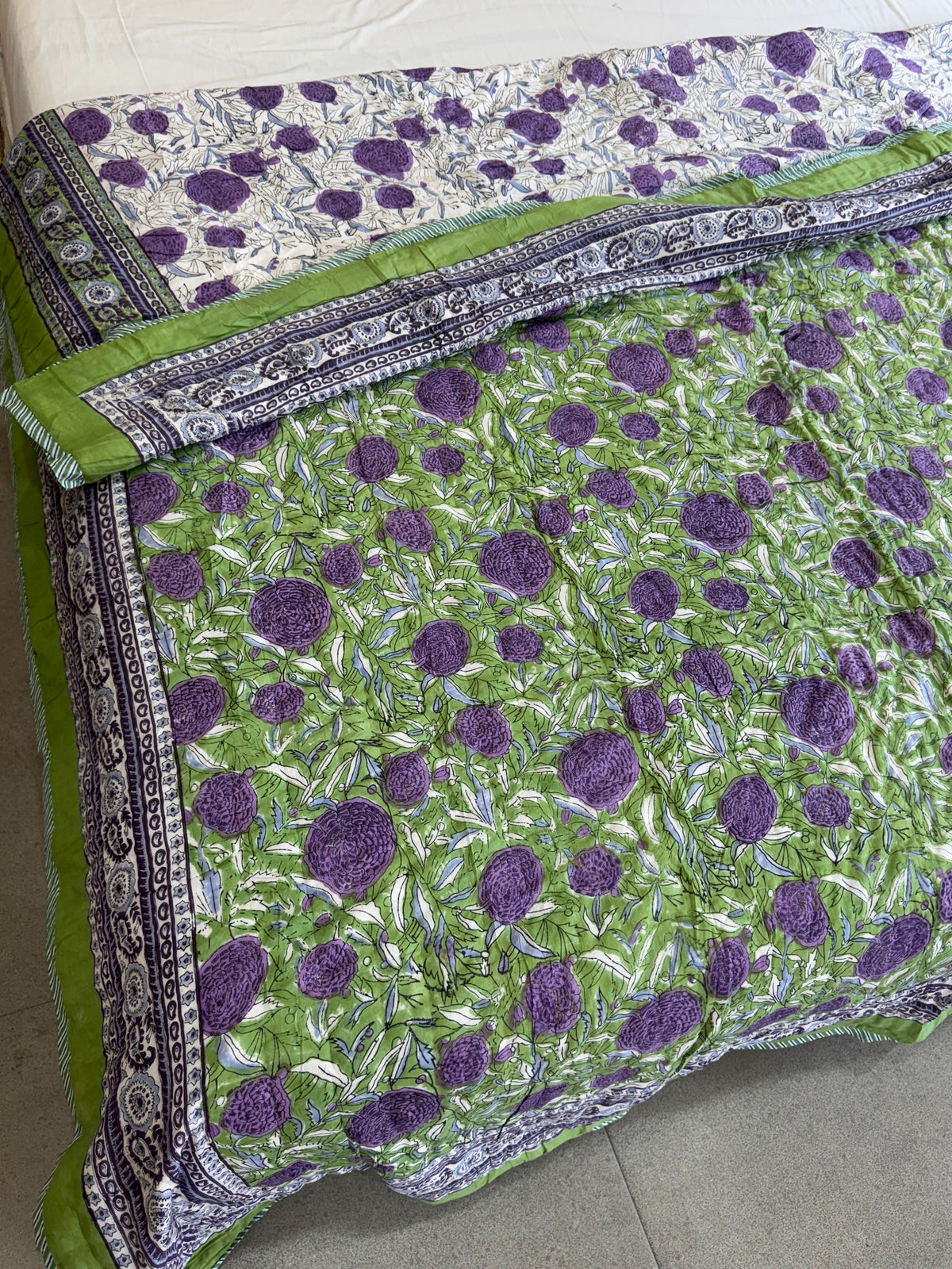 FESTIVE HAND BLOCK PRINTED REVERSIBLE QUILT (DOUBLE BED)