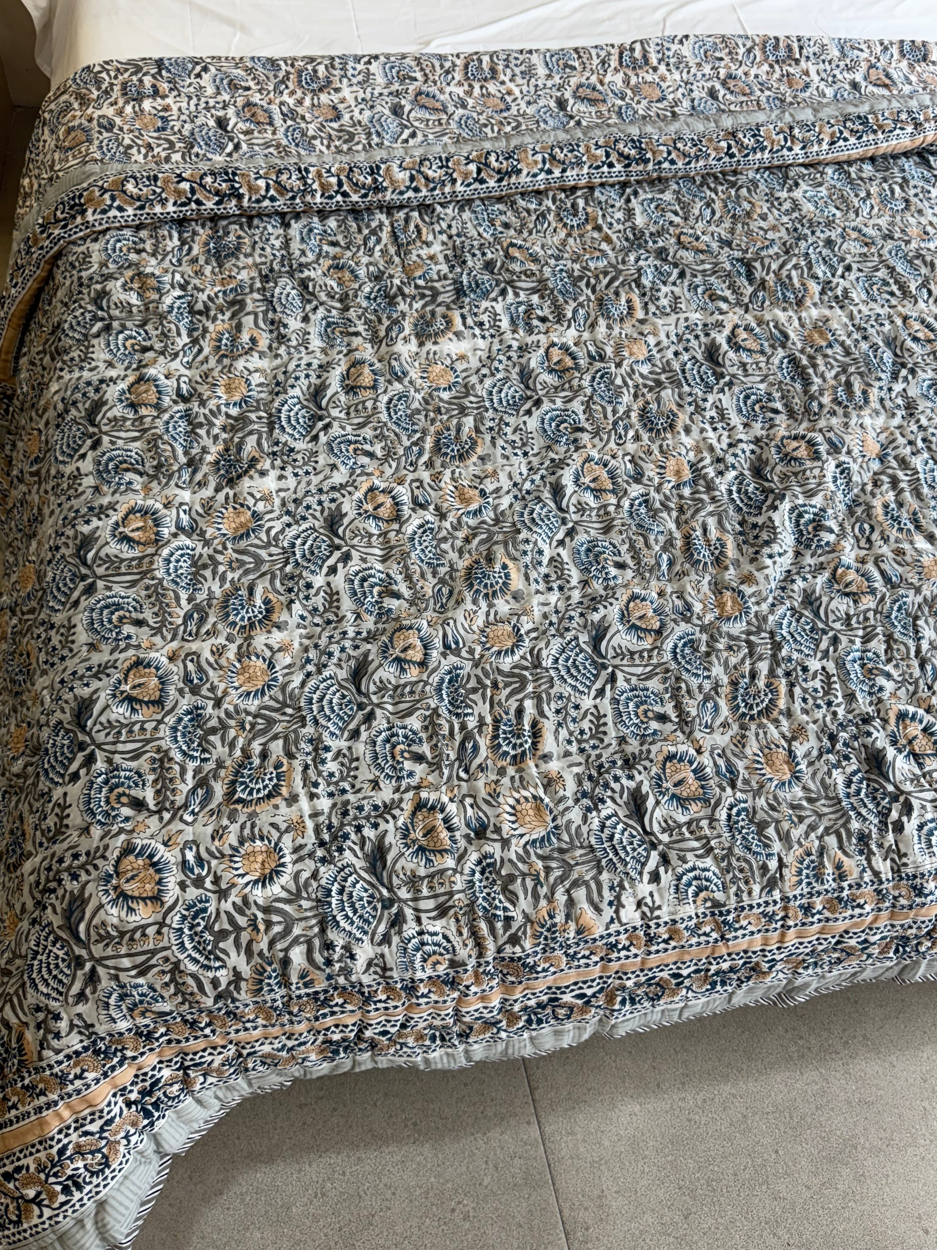 FESTIVE HAND BLOCK PRINTED REVERSIBLE QUILT (DOUBLE BED)