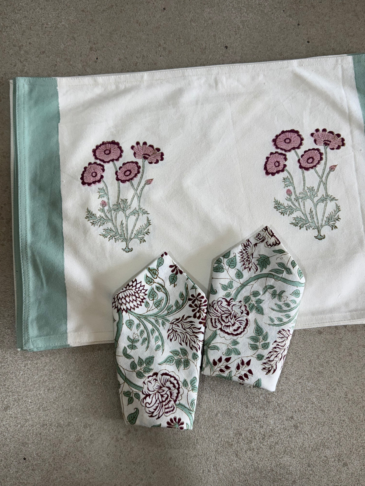 A PAIR OF HANDBLOCK PRINTED TABLE MAT AND NAPKIN SET