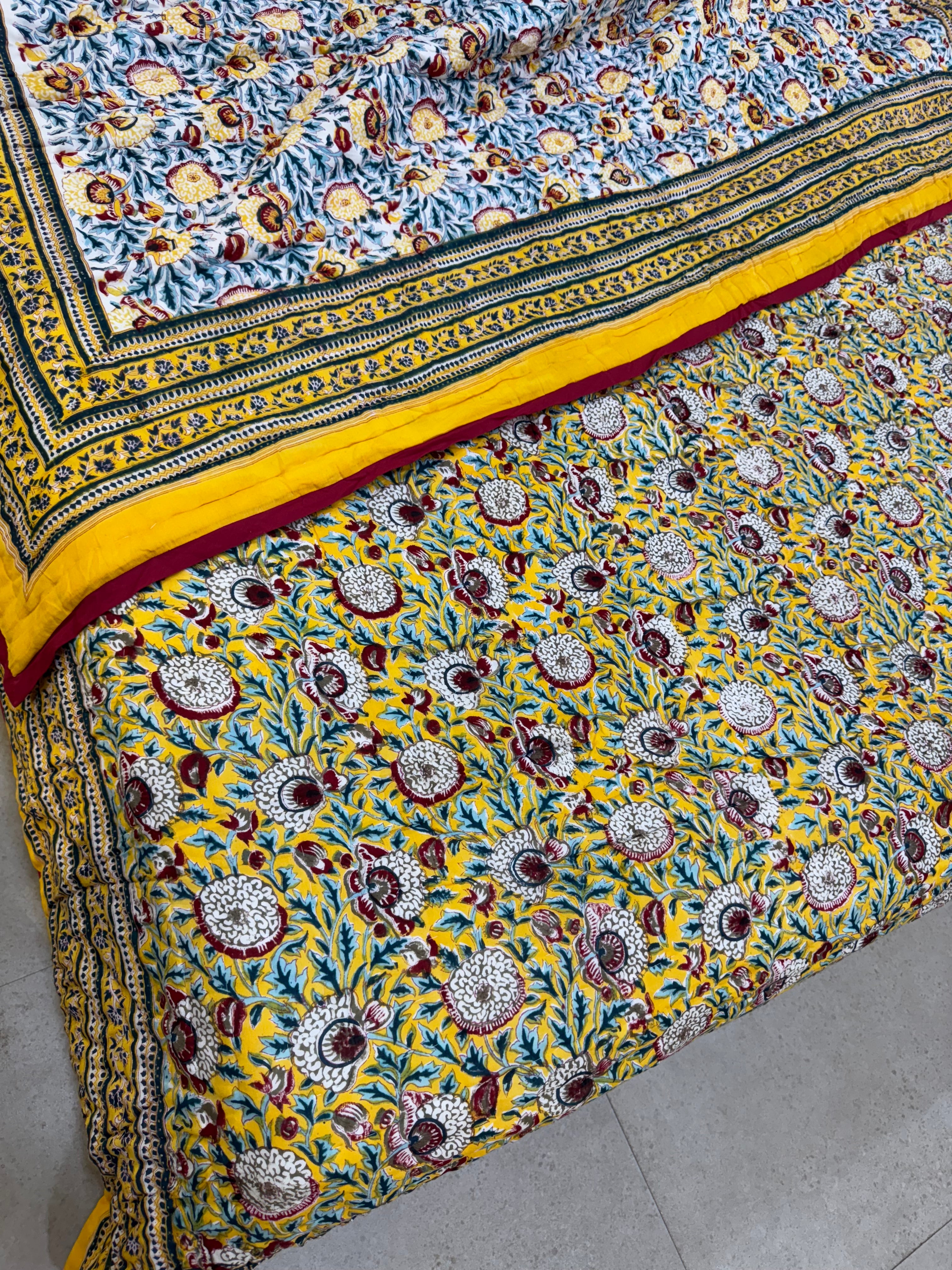 FESTIVE HAND BLOCK PRINTED REVERSIBLE QUILT (DOUBLE BED)