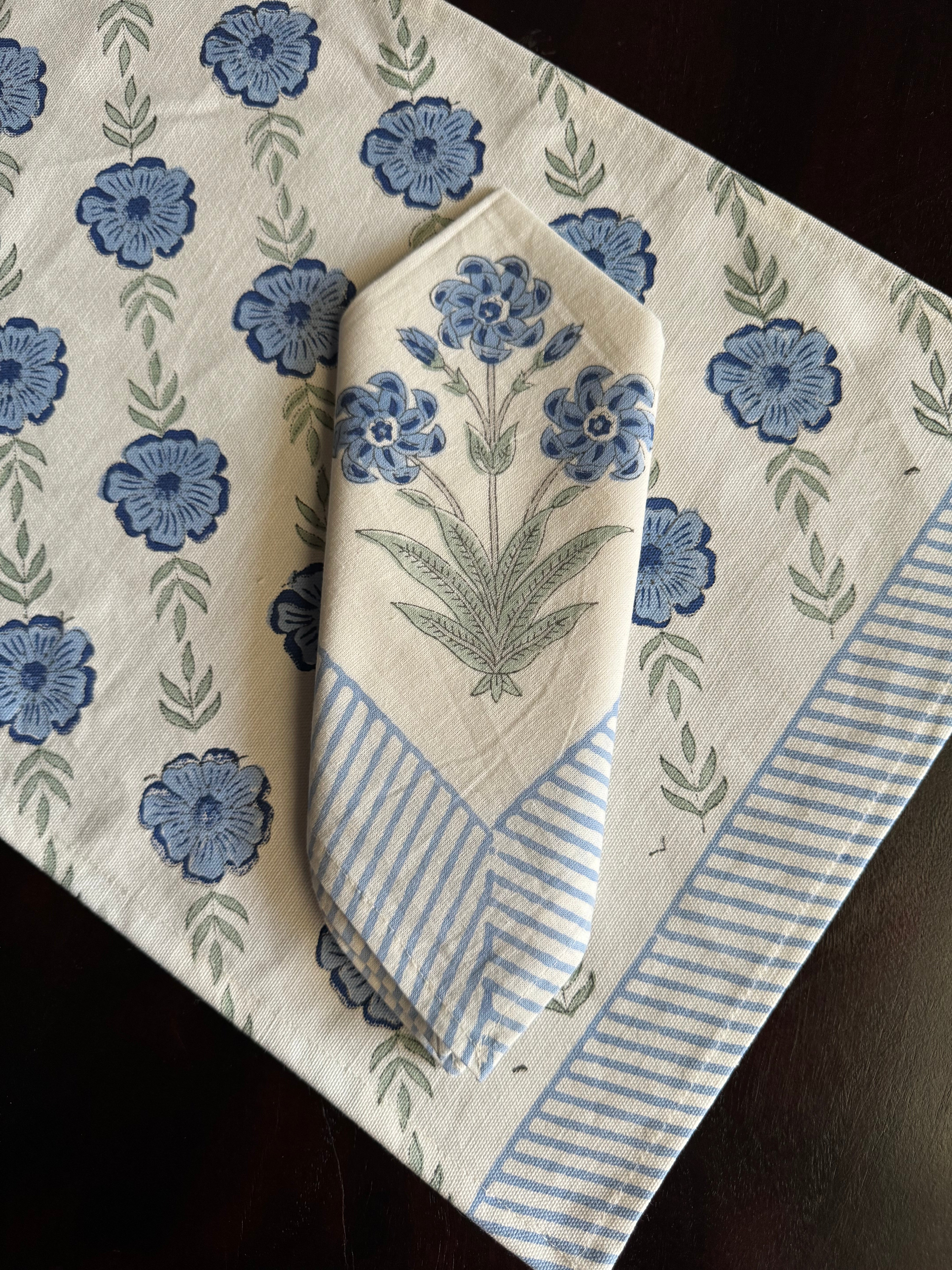 A PAIR OF HANDBLOCK PRINTED TABLE MAT AND NAPKIN SET