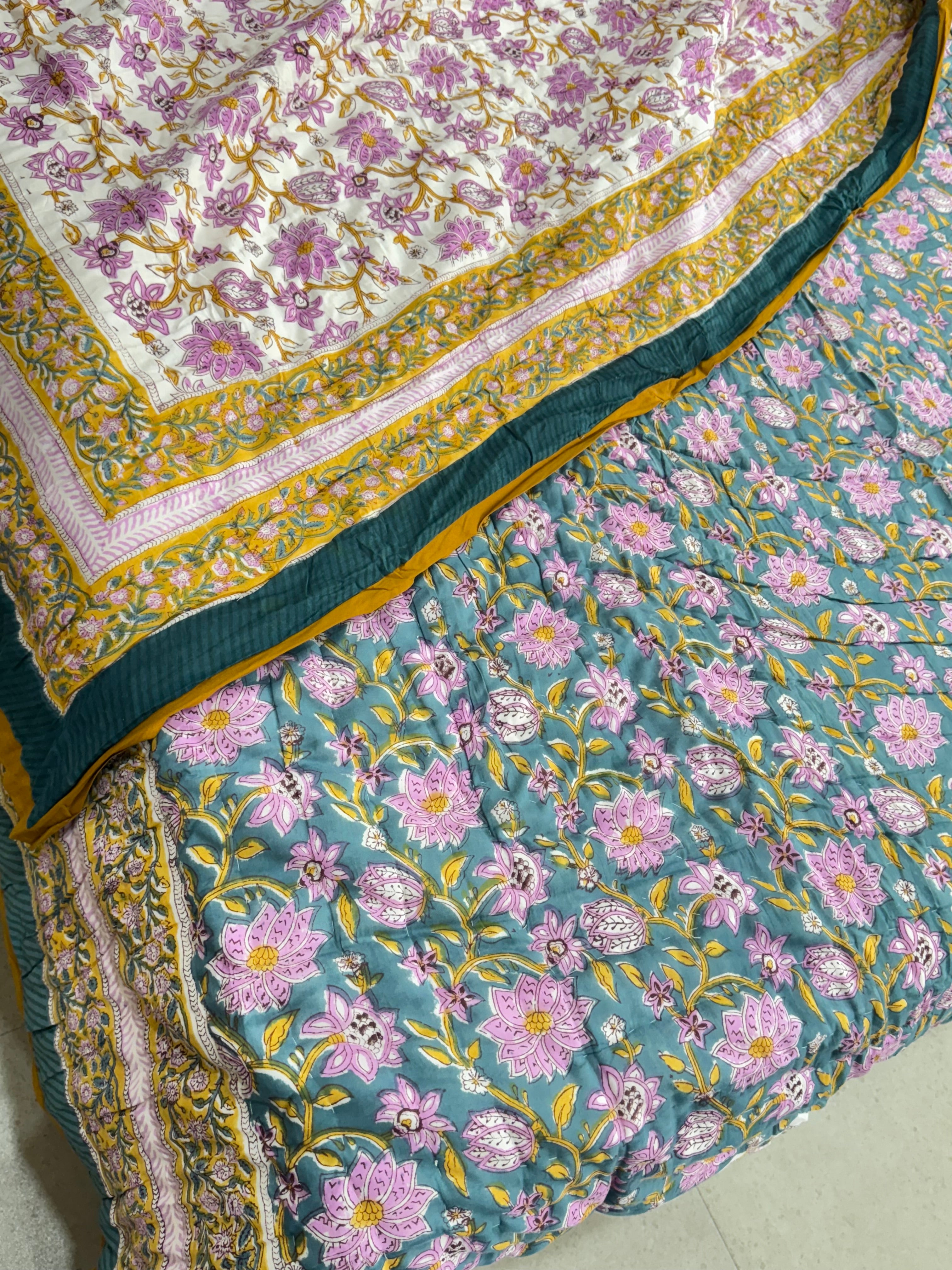FESTIVE HAND BLOCK PRINTED REVERSIBLE QUILT (SINGLE BED)