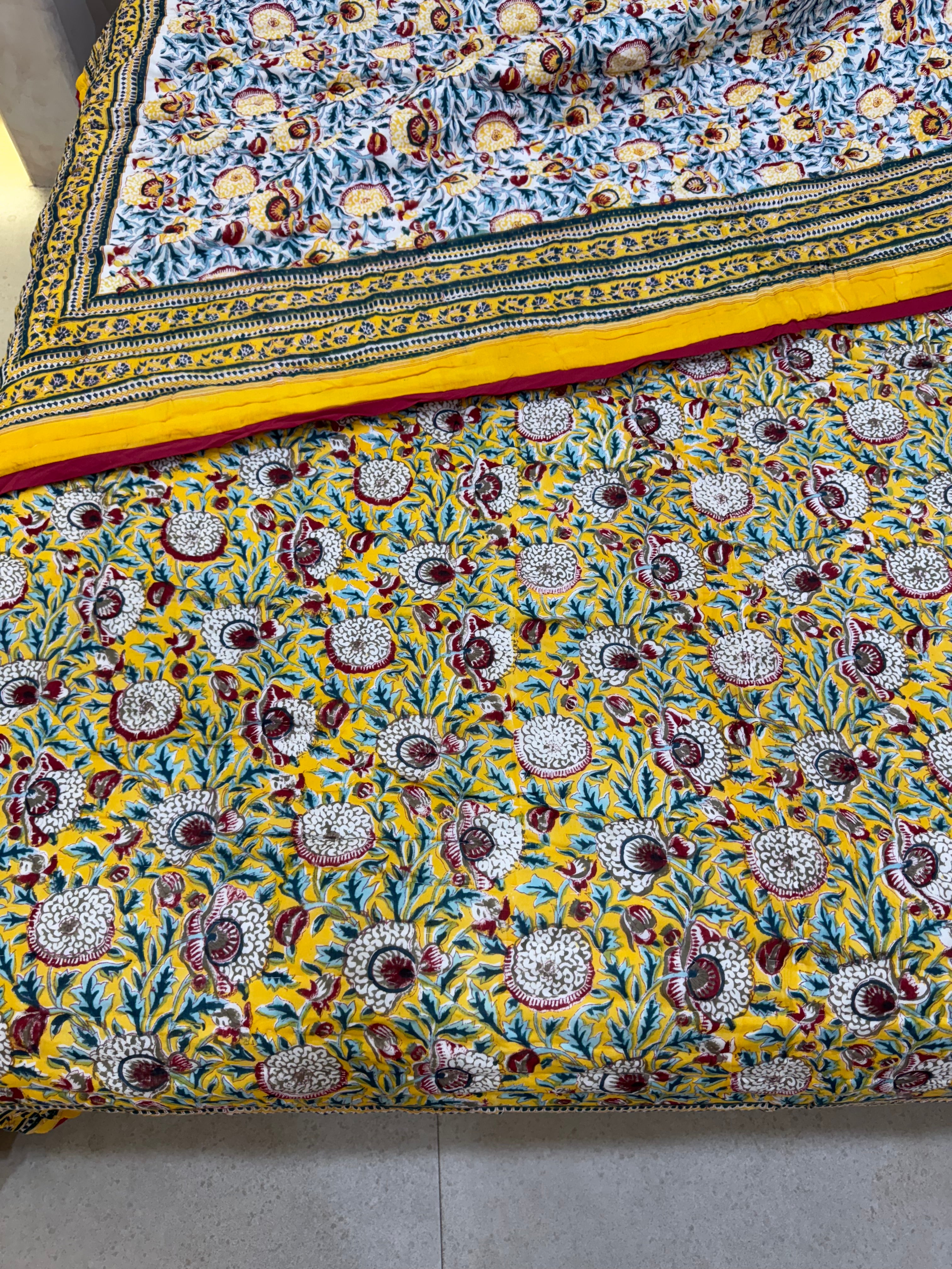 FESTIVE HAND BLOCK PRINTED REVERSIBLE QUILT (DOUBLE BED)